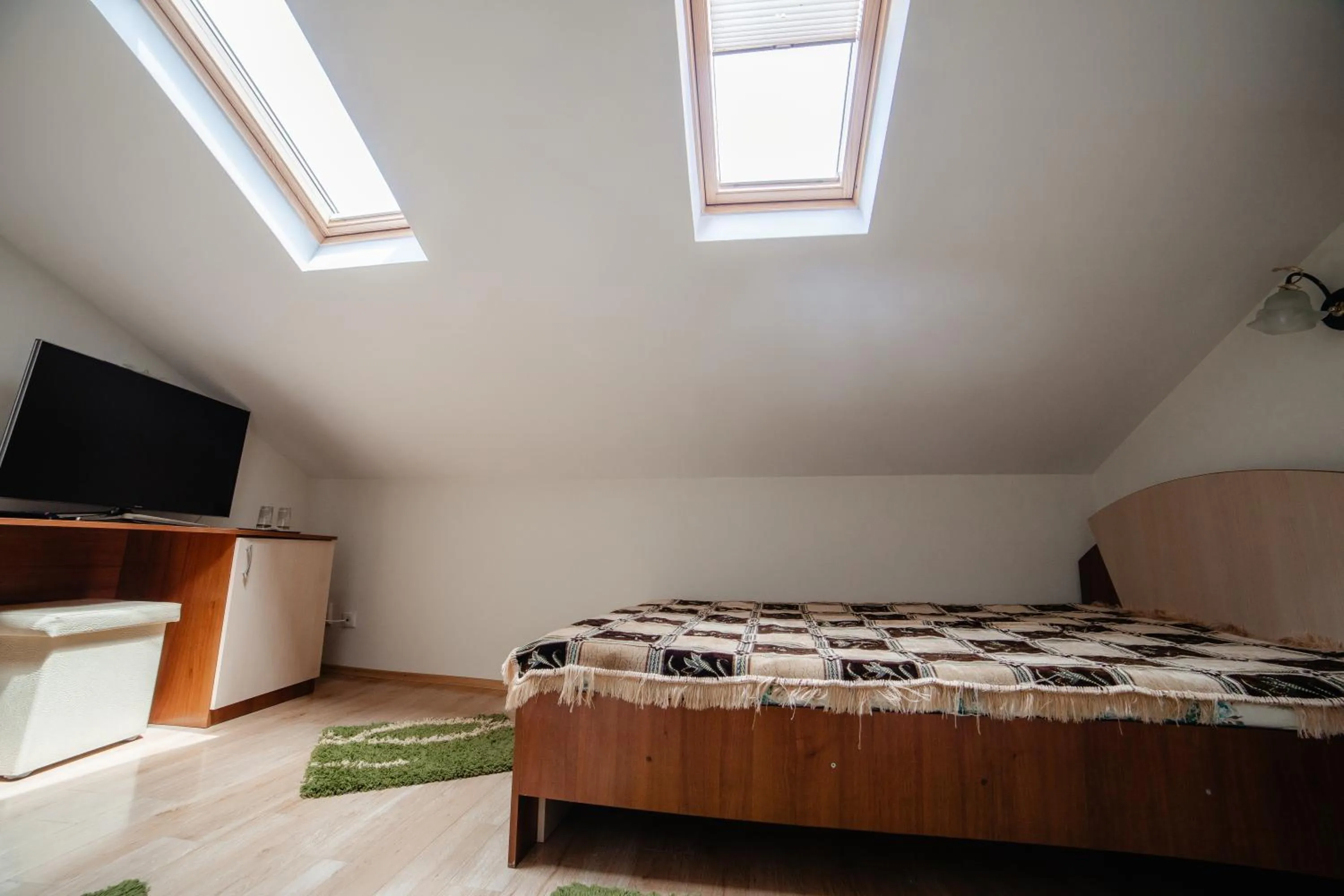 Communal lounge/ TV room in Pensiunea Floare de Colţ