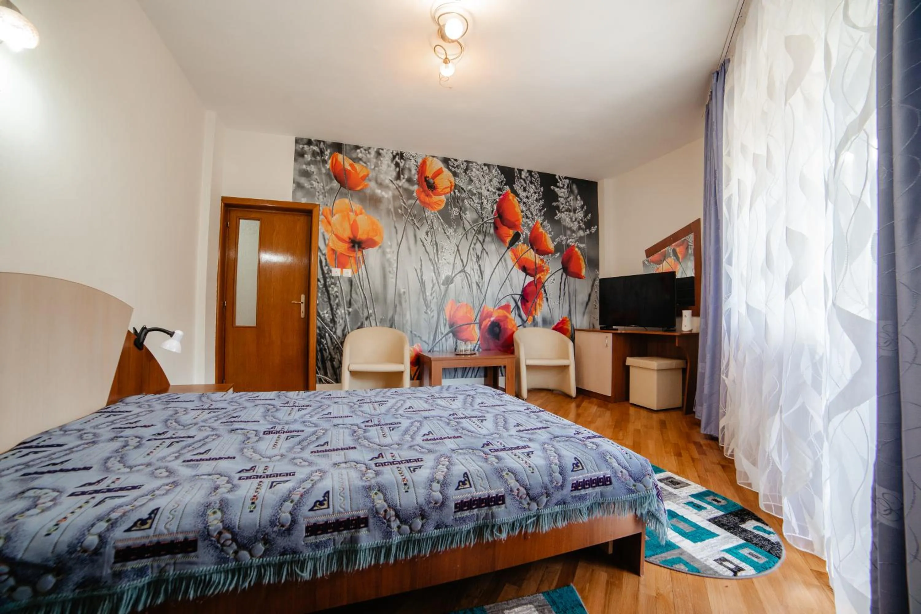 Bed in Pensiunea Floare de Colţ