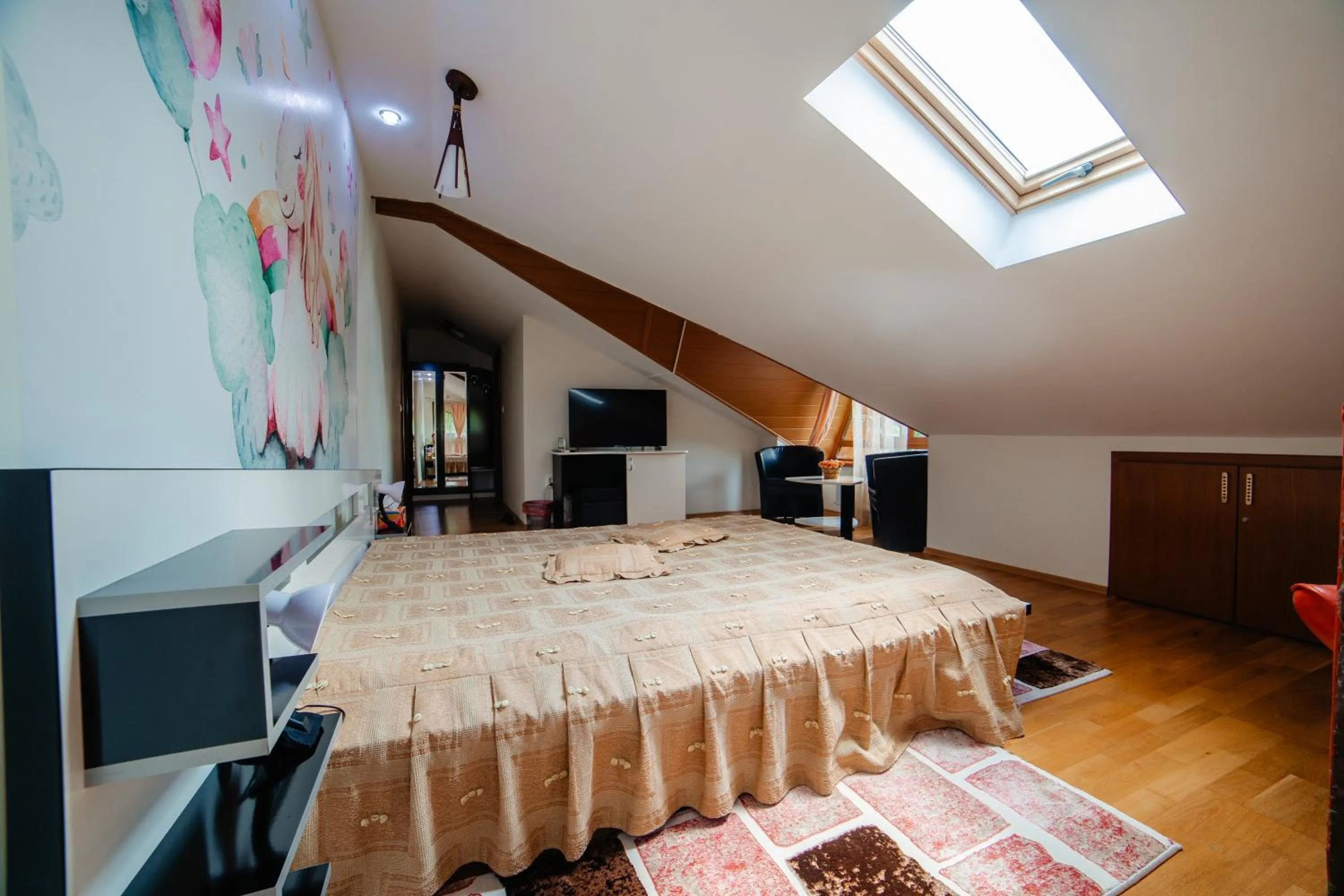 Communal lounge/ TV room in Pensiunea Floare de Colţ