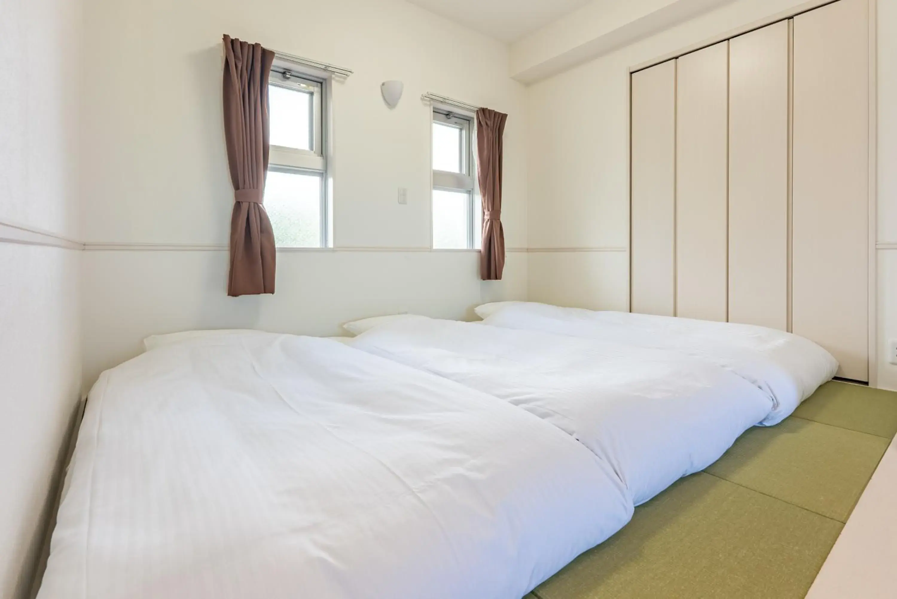 Bed in Odysis Onna Resort Hotel Bed in Odysis Onna Resort Hotel