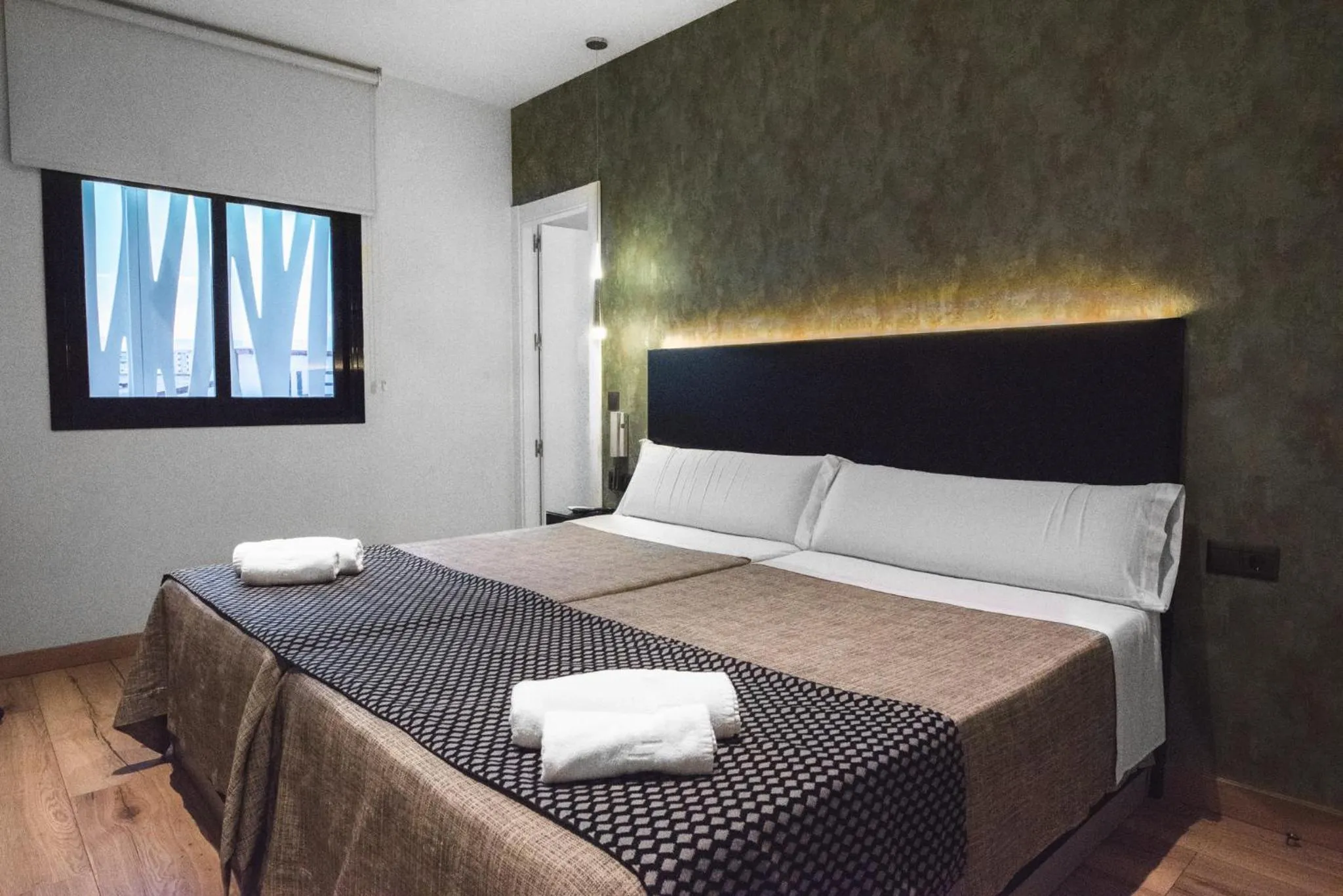 Bed in DAOS Suites & Terrace Marbella