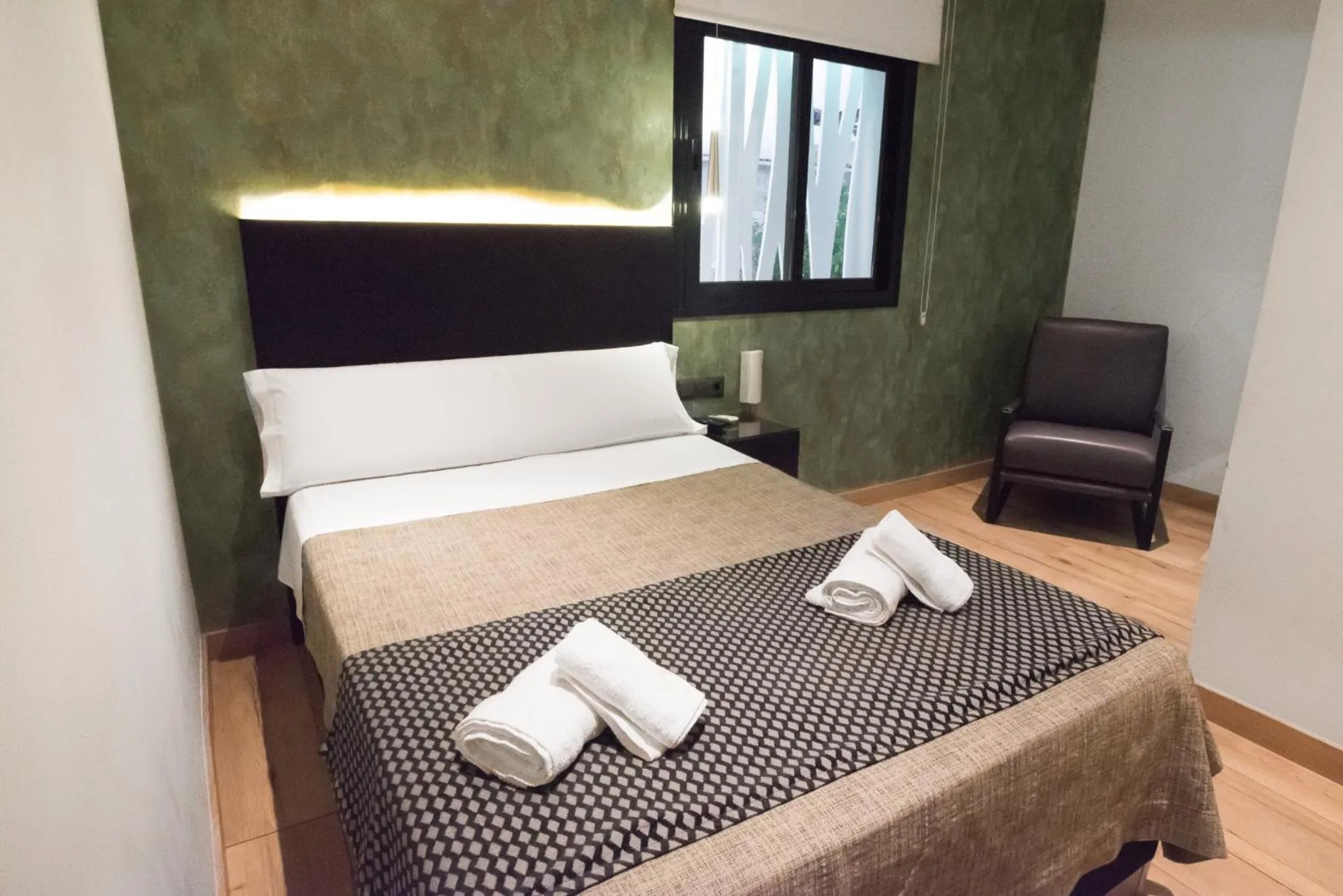 Bed in DAOS Suites & Terrace Marbella