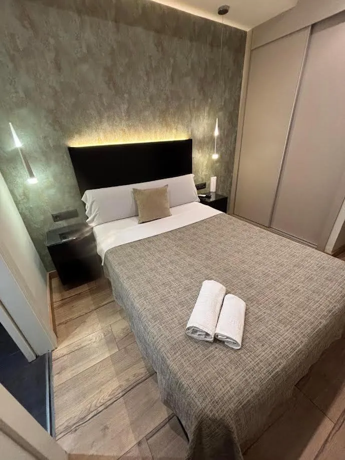 Bed in DAOS Suites & Terrace Marbella