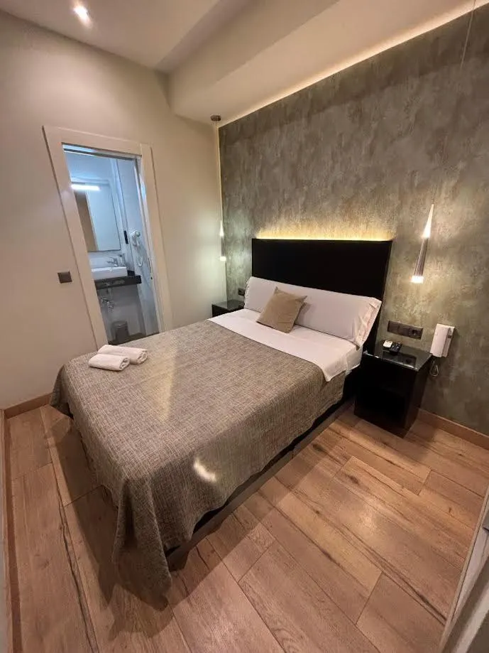 Bed in DAOS Suites & Terrace Marbella