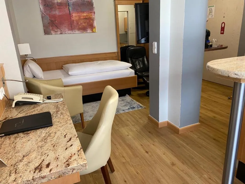 Bed in The KRAL - Business Hotel & Serviced Apartments