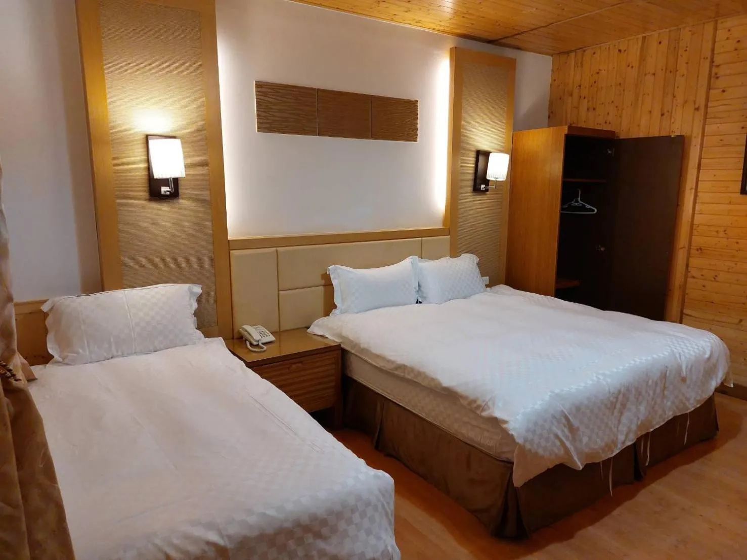 Bed in Dragon Manor Resort