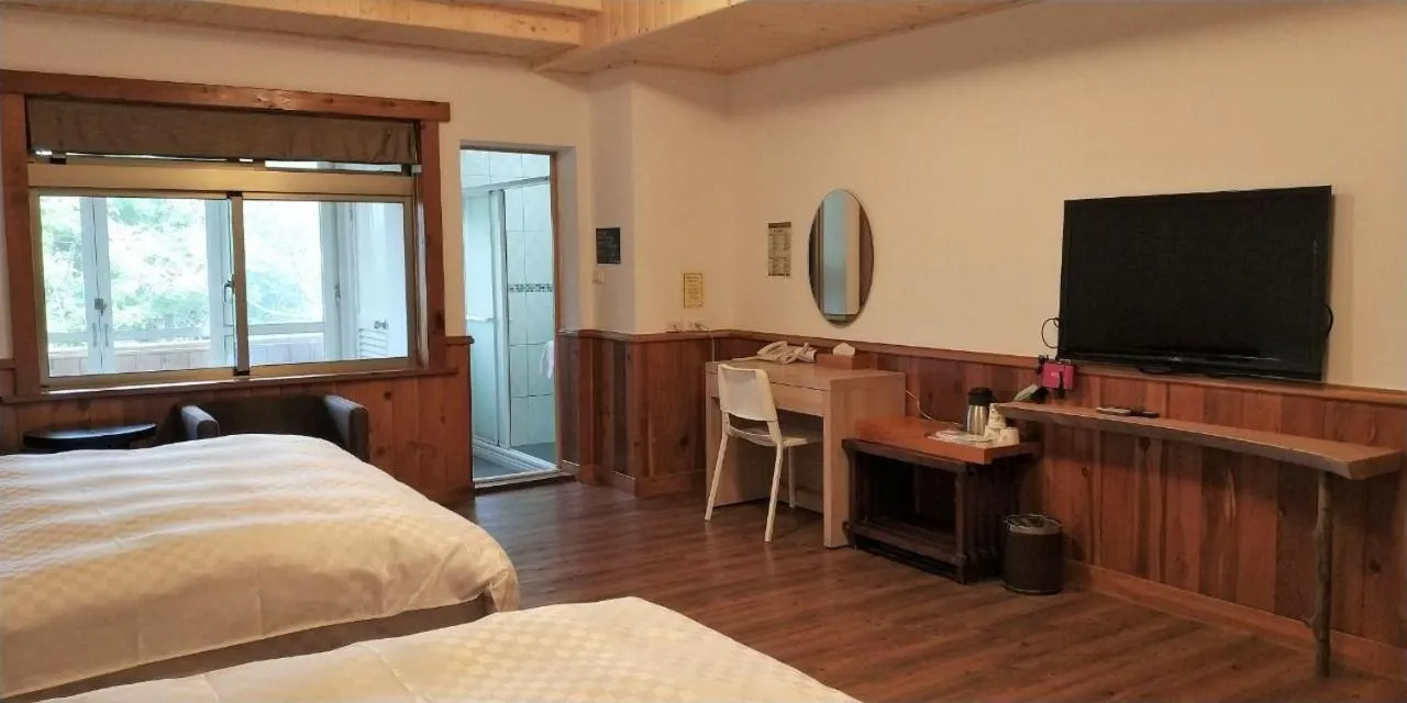 Bed in Dragon Manor Resort