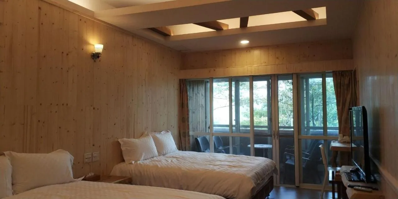 Bed in Dragon Manor Resort