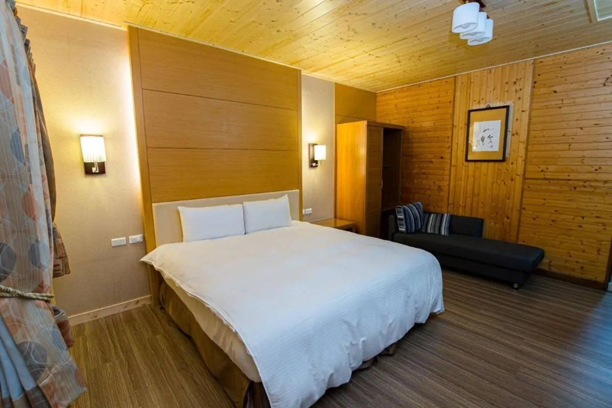 Bed in Dragon Manor Resort