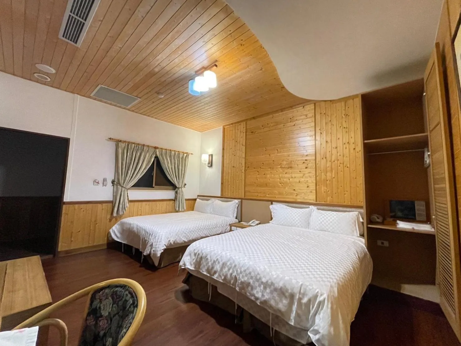 Bed in Dragon Manor Resort