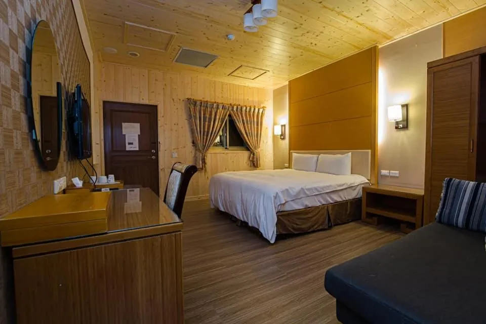 Bed in Dragon Manor Resort