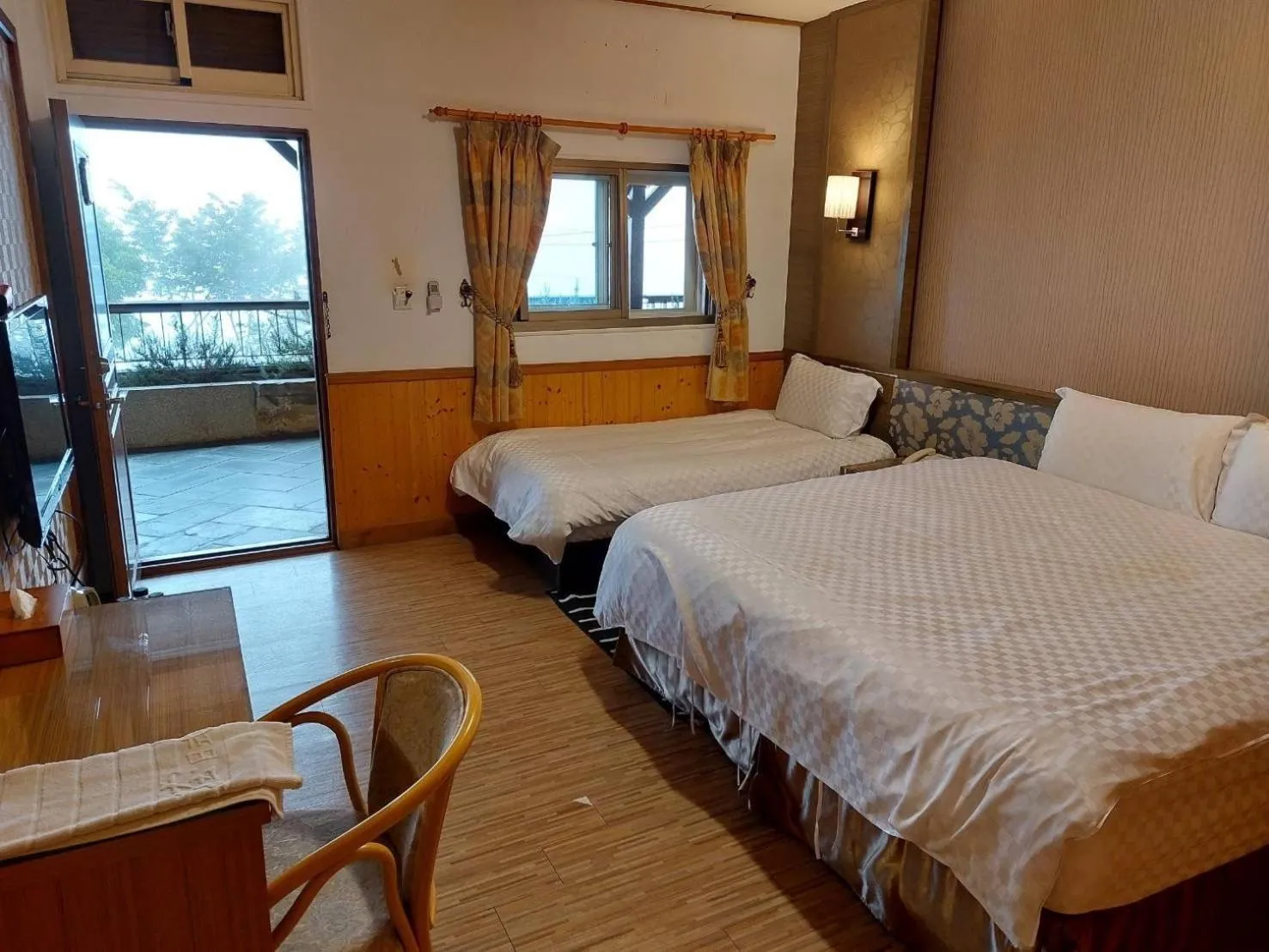 Bed in Dragon Manor Resort