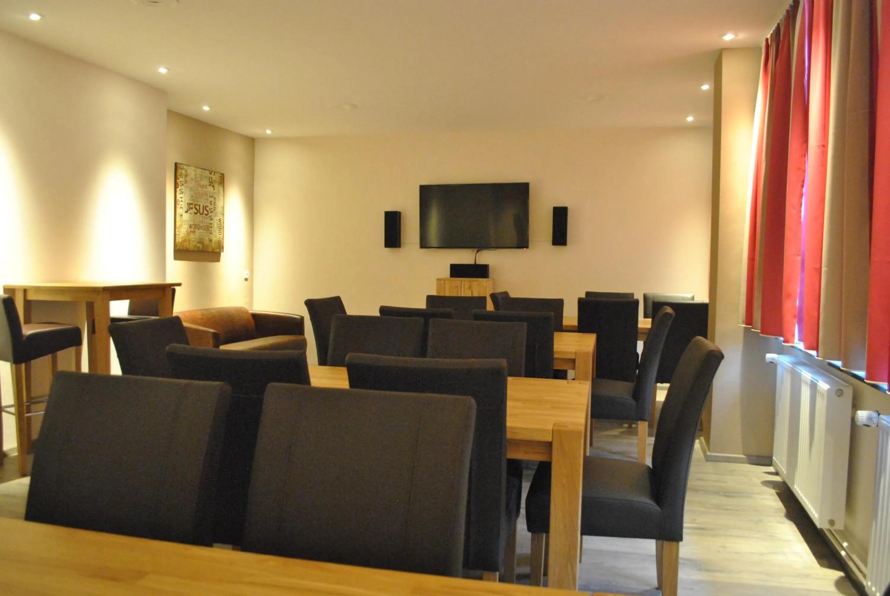 Communal lounge/ TV room in Flambacher Mühle