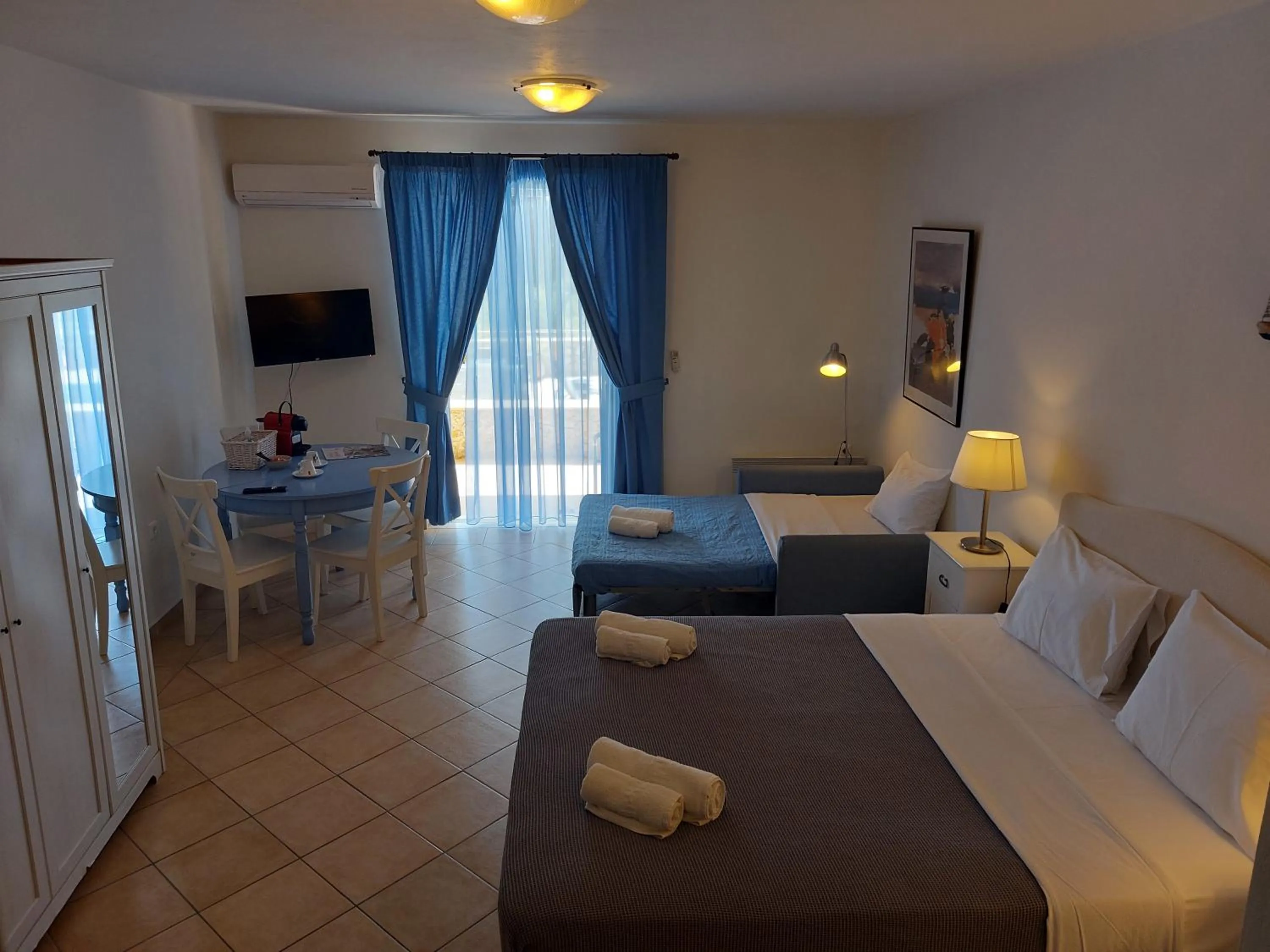 TV and multimedia, Bed in PLEIADES lUXURY APARTMENTS