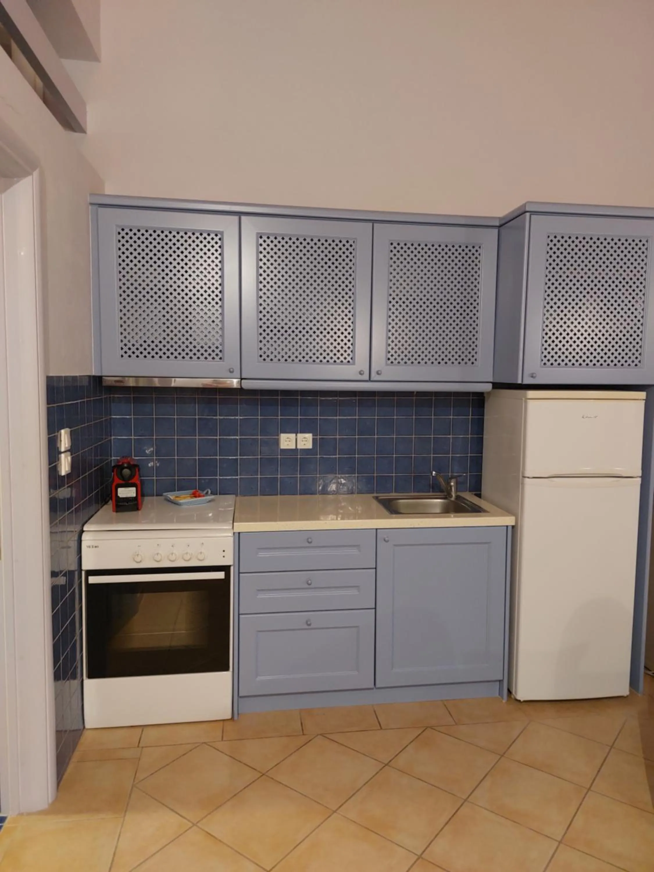 Kitchen or kitchenette in PLEIADES lUXURY APARTMENTS