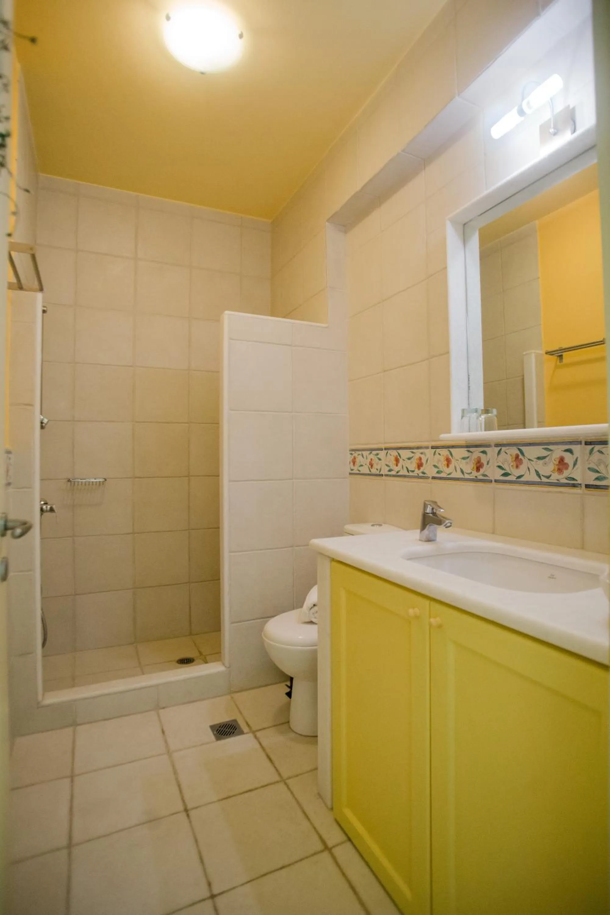 Shower in PLEIADES lUXURY APARTMENTS