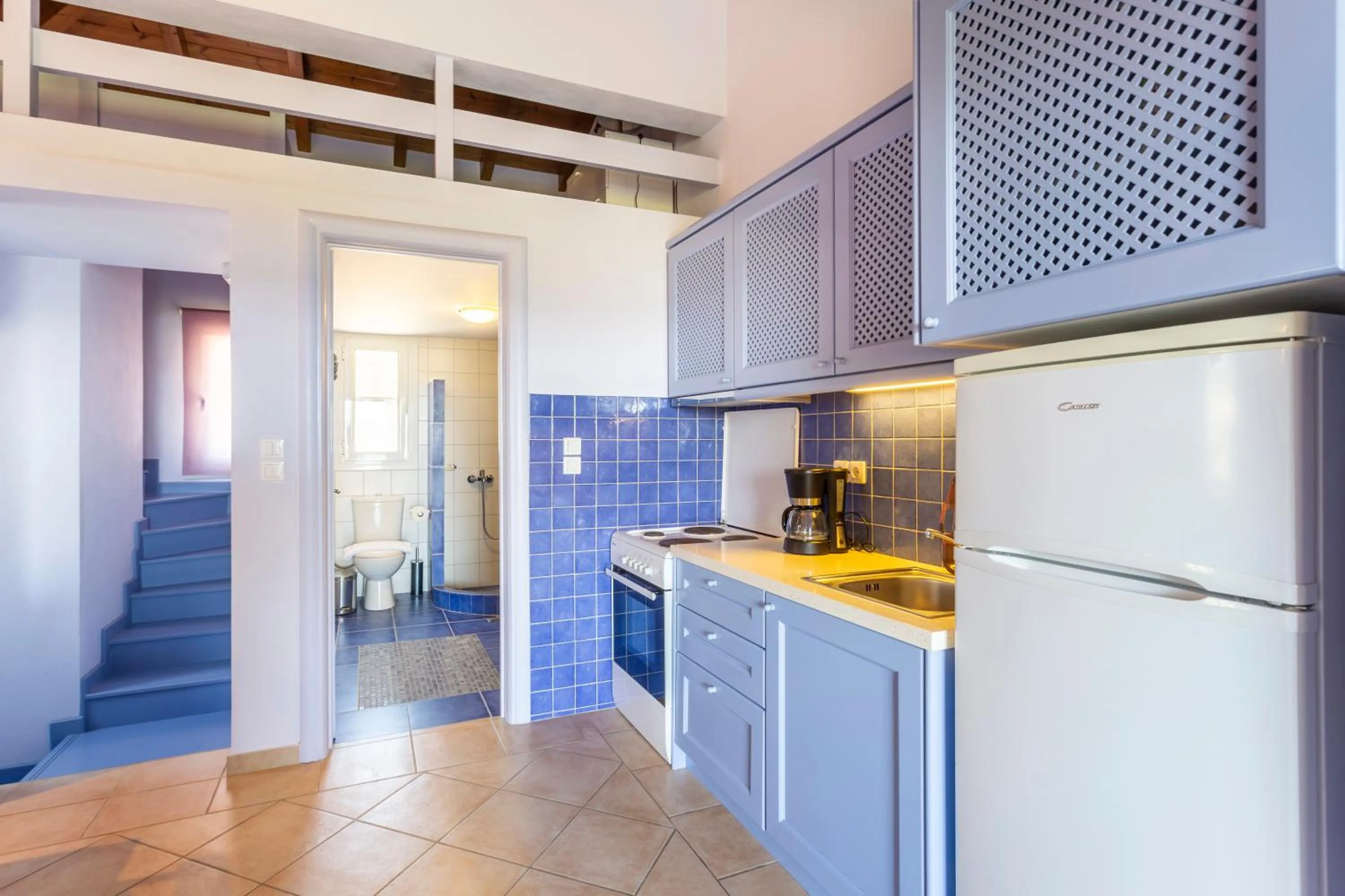 Kitchen or kitchenette in PLEIADES lUXURY APARTMENTS