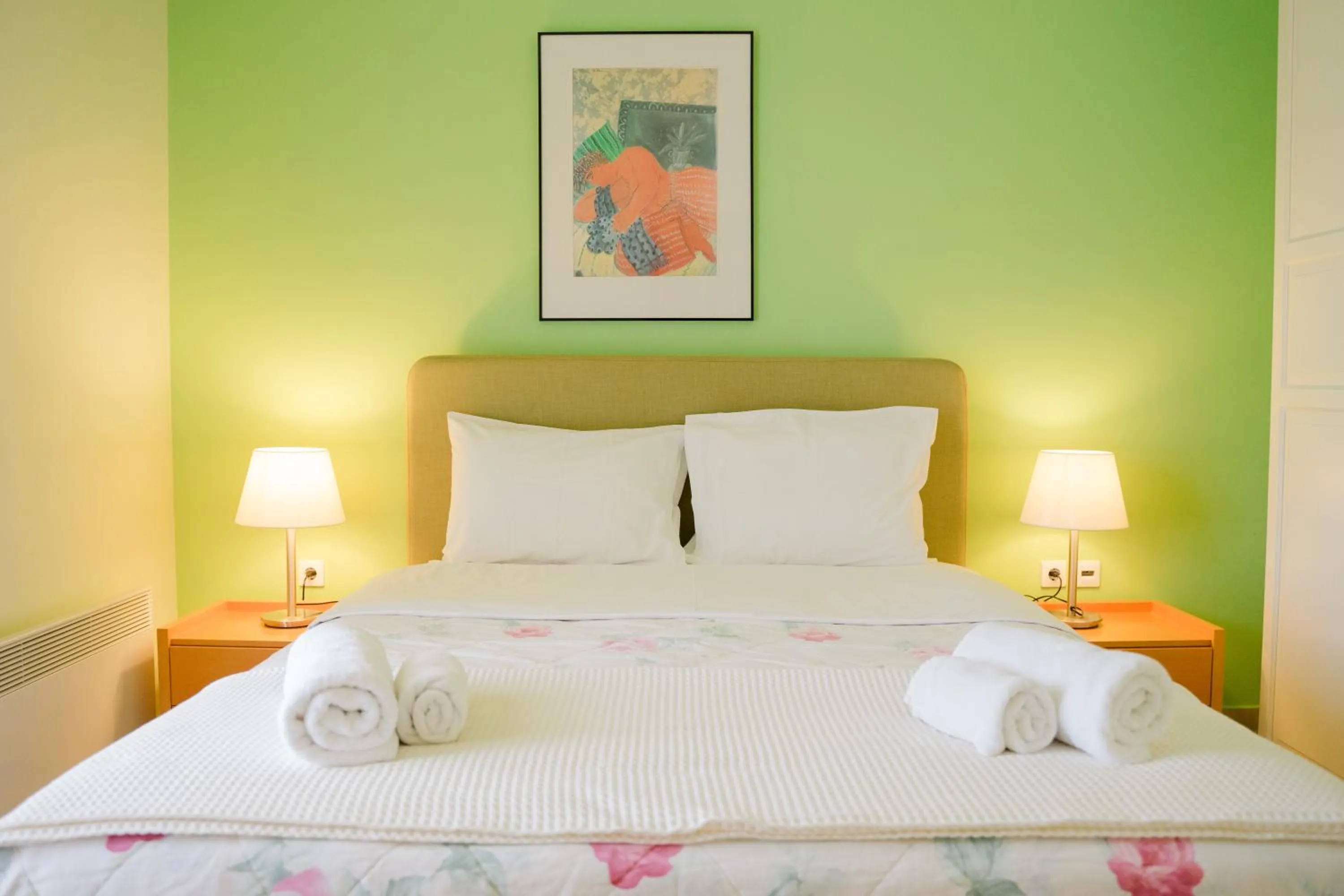 Bed in PLEIADES lUXURY APARTMENTS