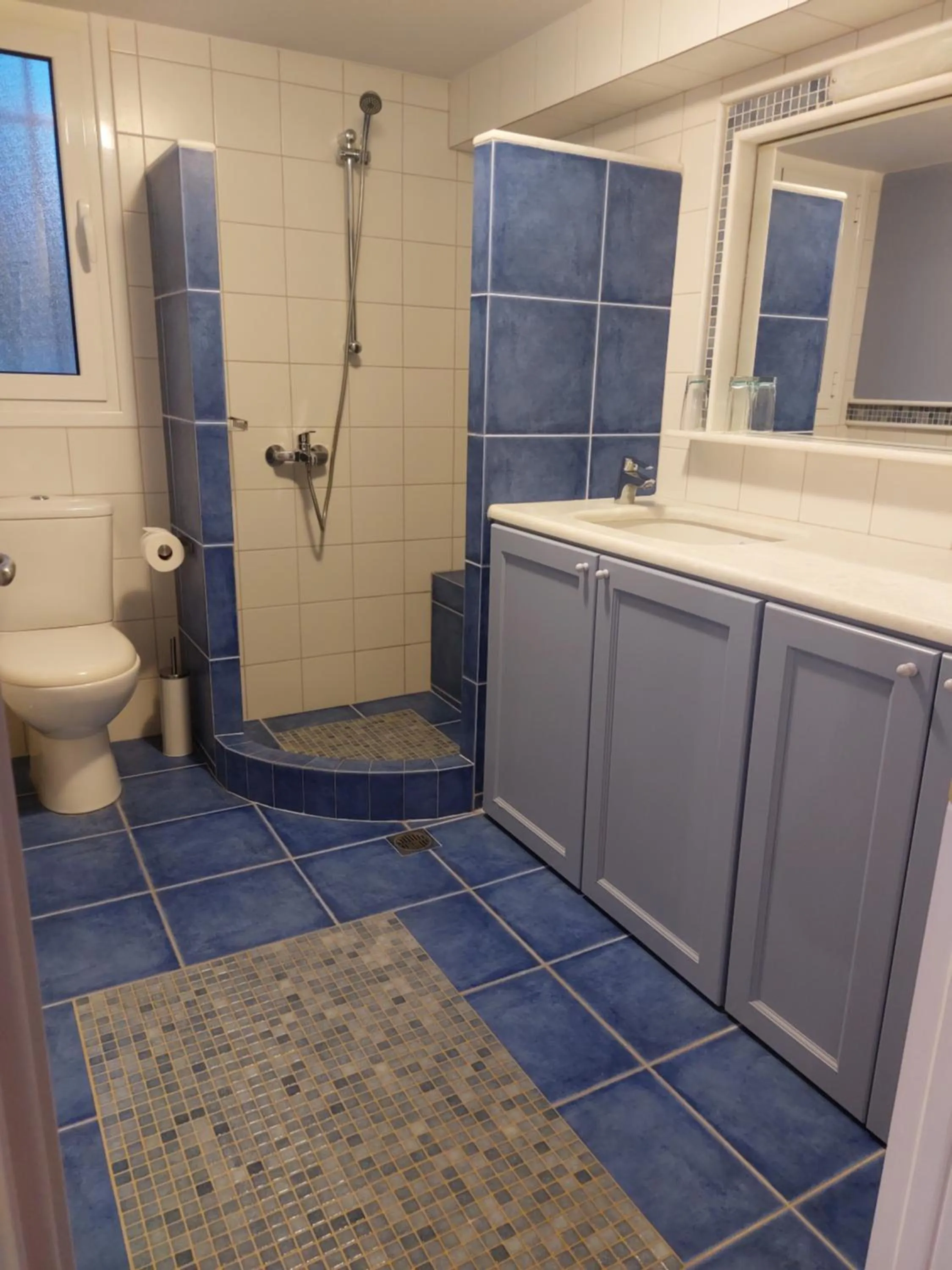 Shower in PLEIADES lUXURY APARTMENTS