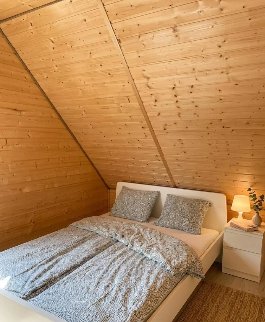 Bed in Domki Hippalos Jarosławiec