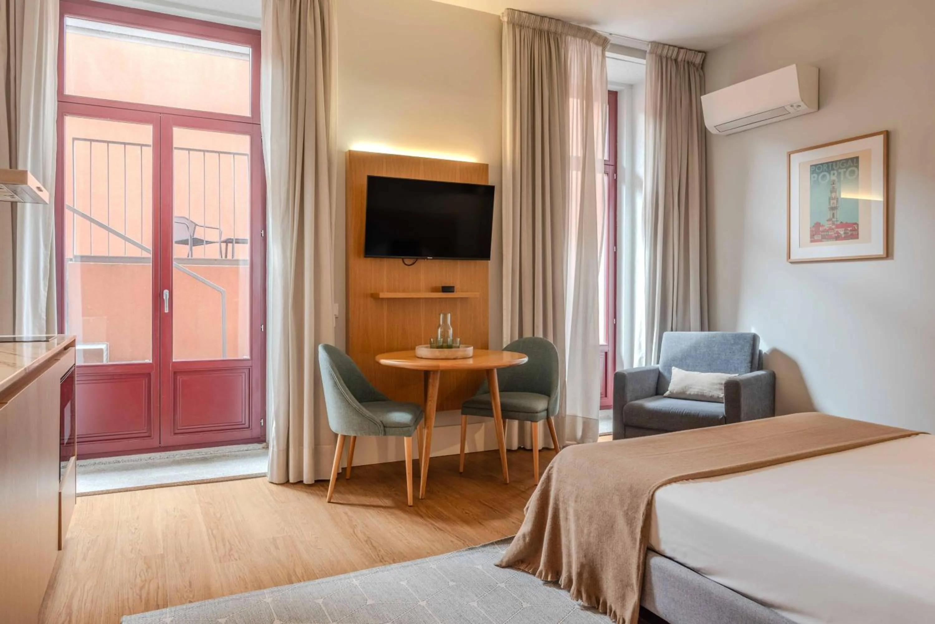 TV and multimedia, Bed in Uma Formosa Apartments