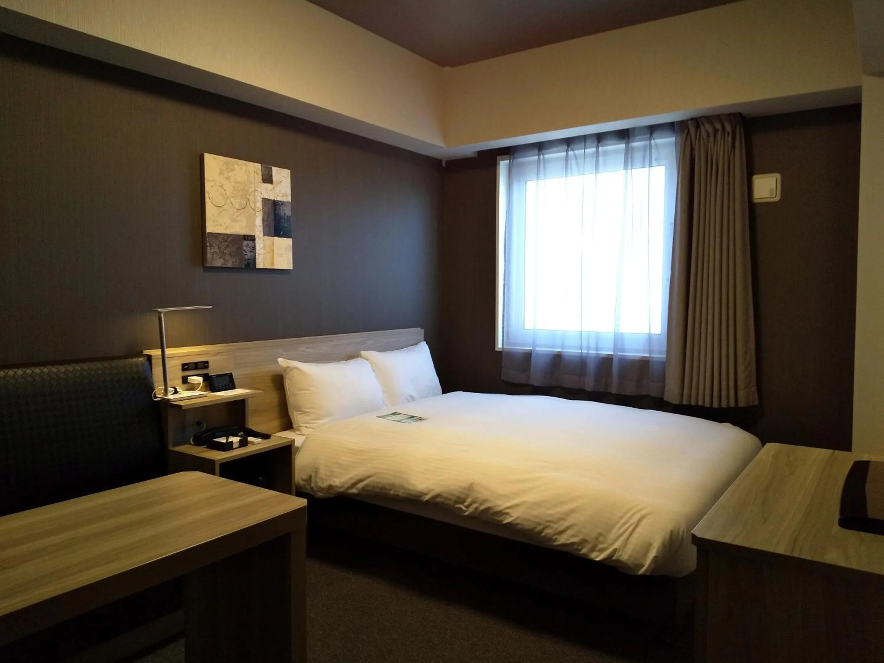 Photo of the whole room, Bed in Hotel Route-Inn Mihara Ekimae