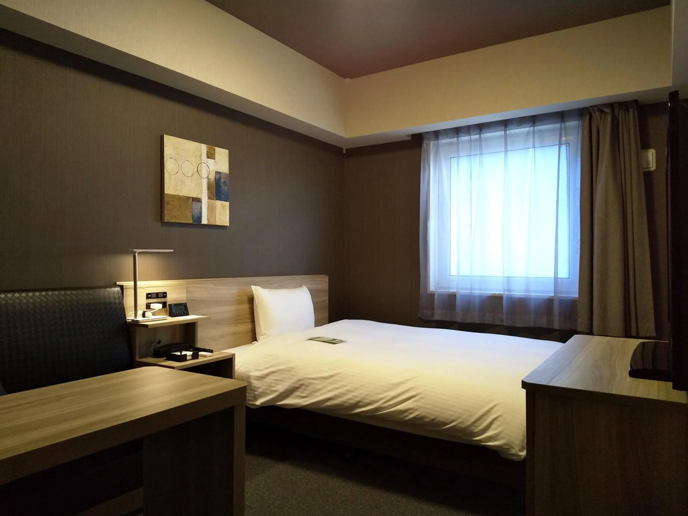 Photo of the whole room, Bed in Hotel Route-Inn Mihara Ekimae