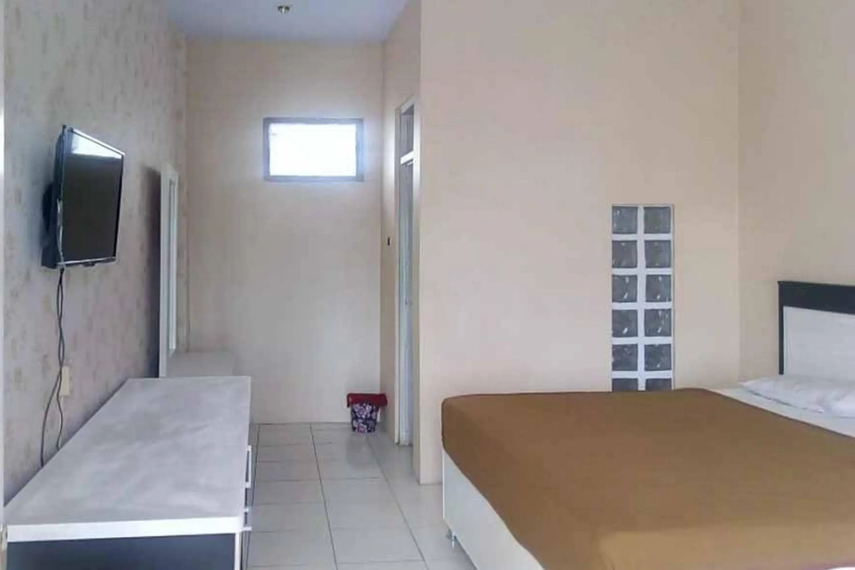 Bed in RedDoorz Syariah @ Hotel Kencana Tasikmalaya Bed in RedDoorz Syariah @ Hotel Kencana Tasikmalaya