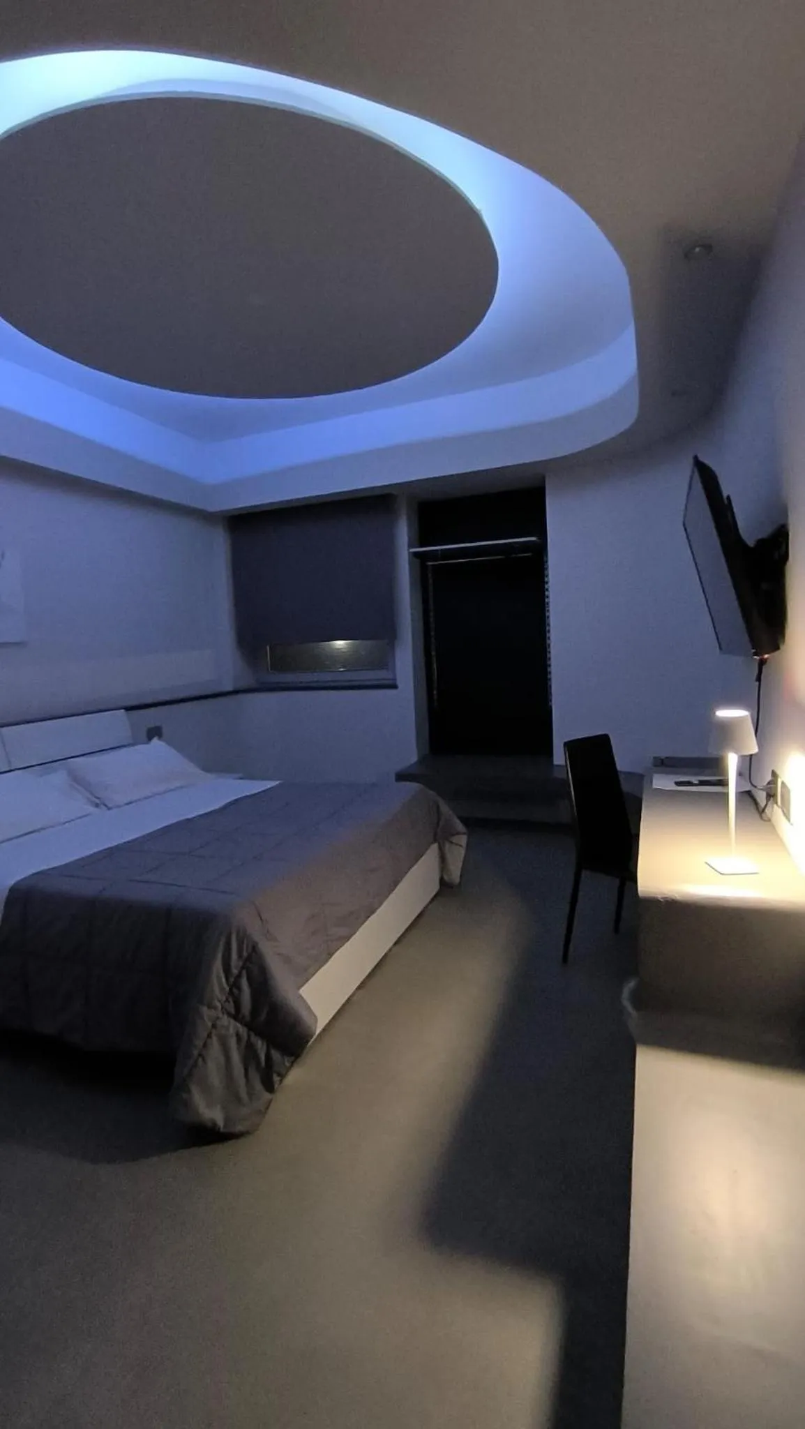 Bed in HOTEL QUADRIFOGLIO