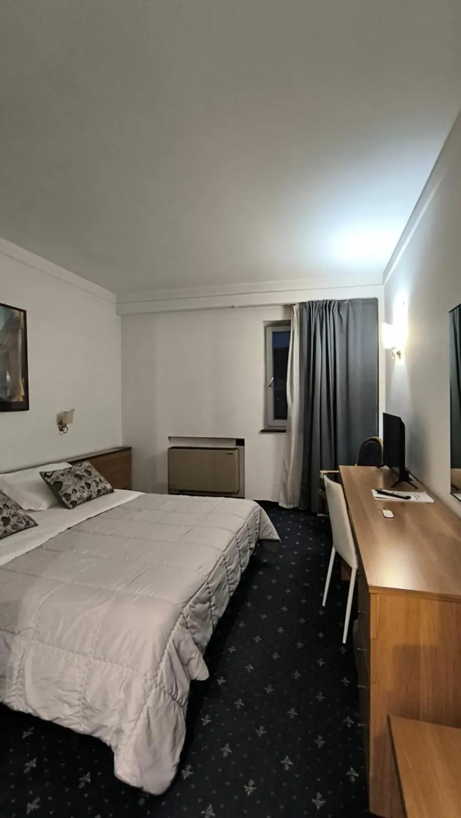 Bed in HOTEL QUADRIFOGLIO