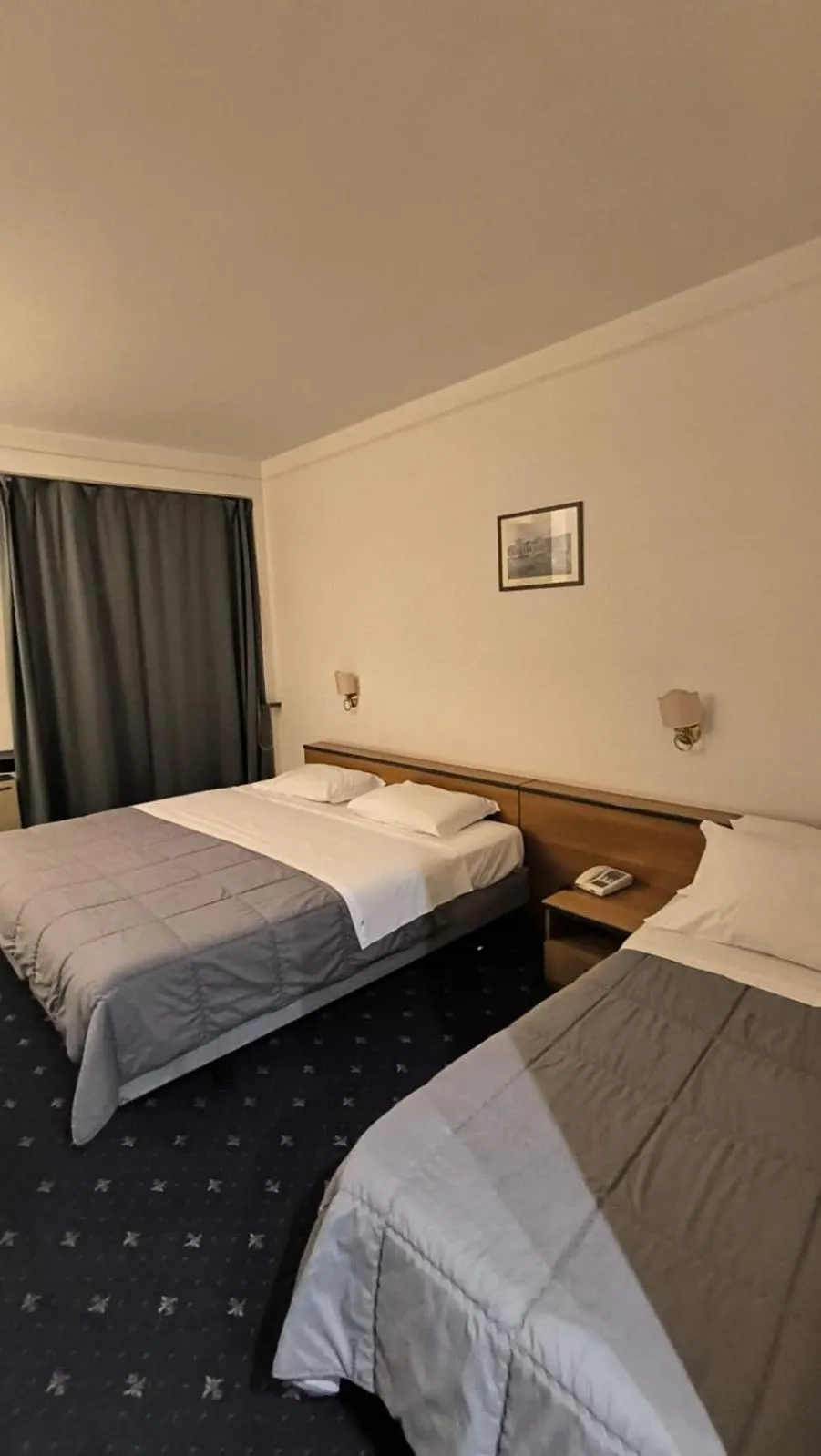 Bed in HOTEL QUADRIFOGLIO