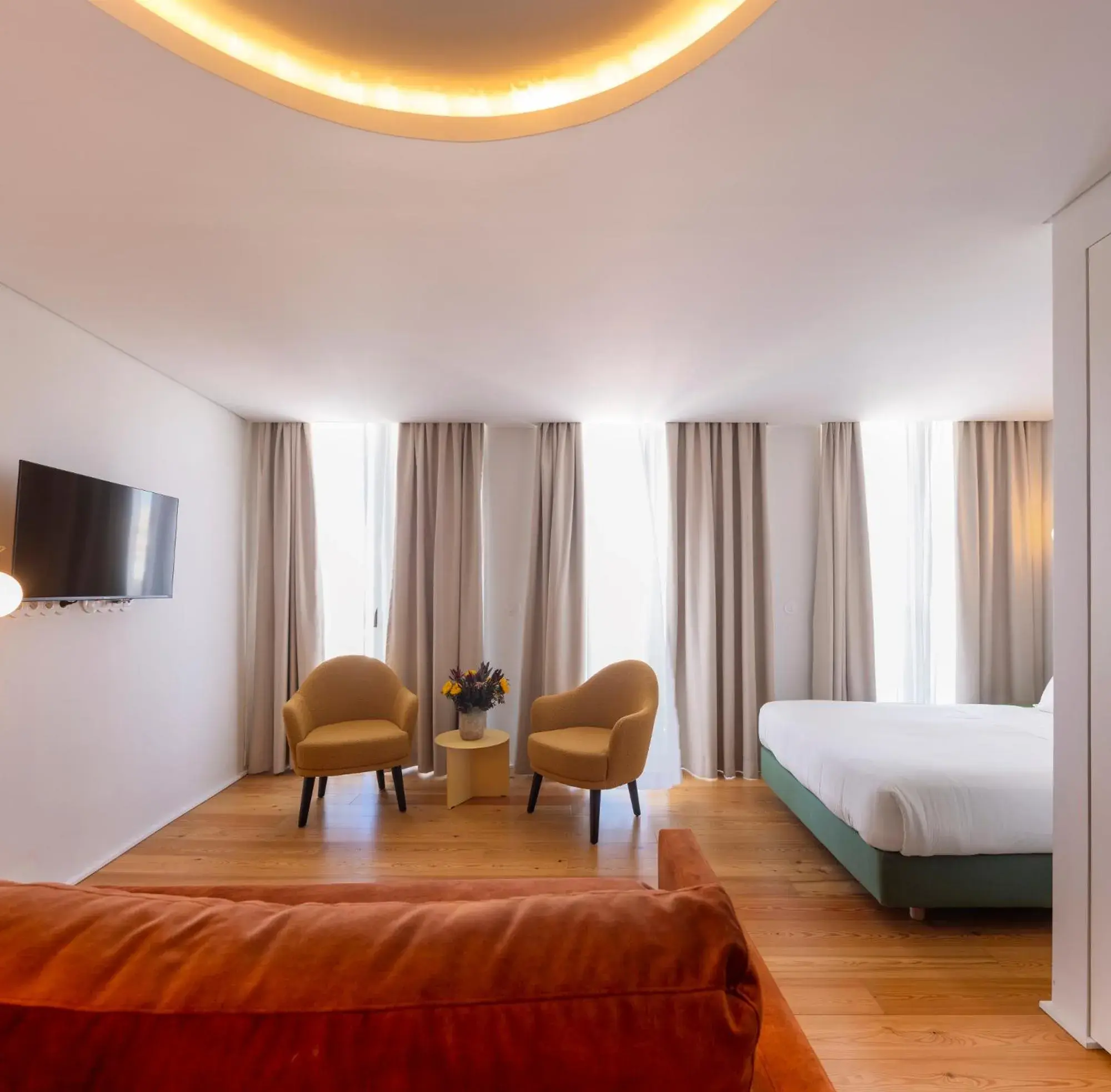 Living room, Bed in Lisbon Serviced Apartments - Estrela Living room, Bed in Lisbon Serviced Apartments - Estrela