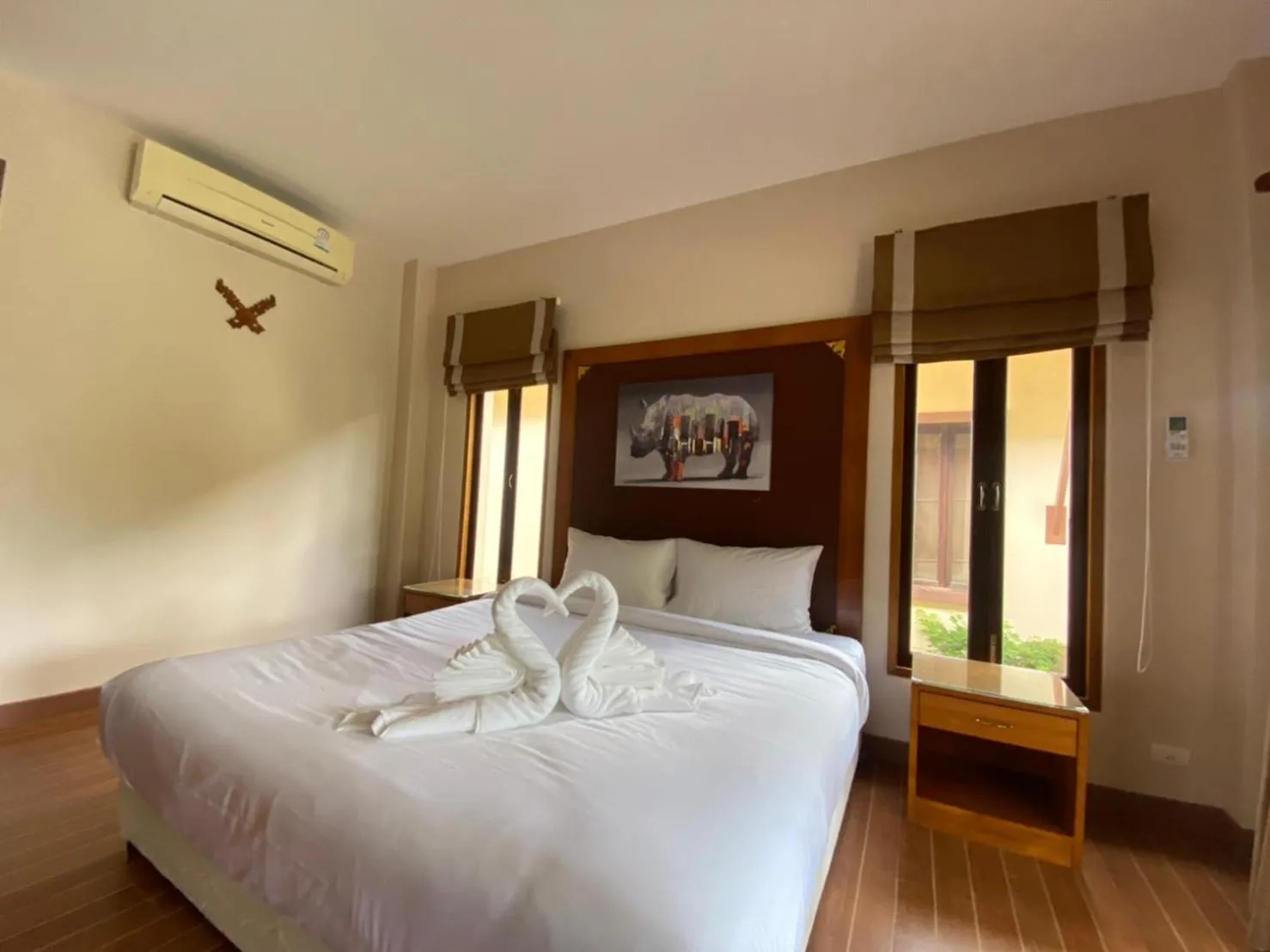 Bed in Chaithalay Khanom Resort