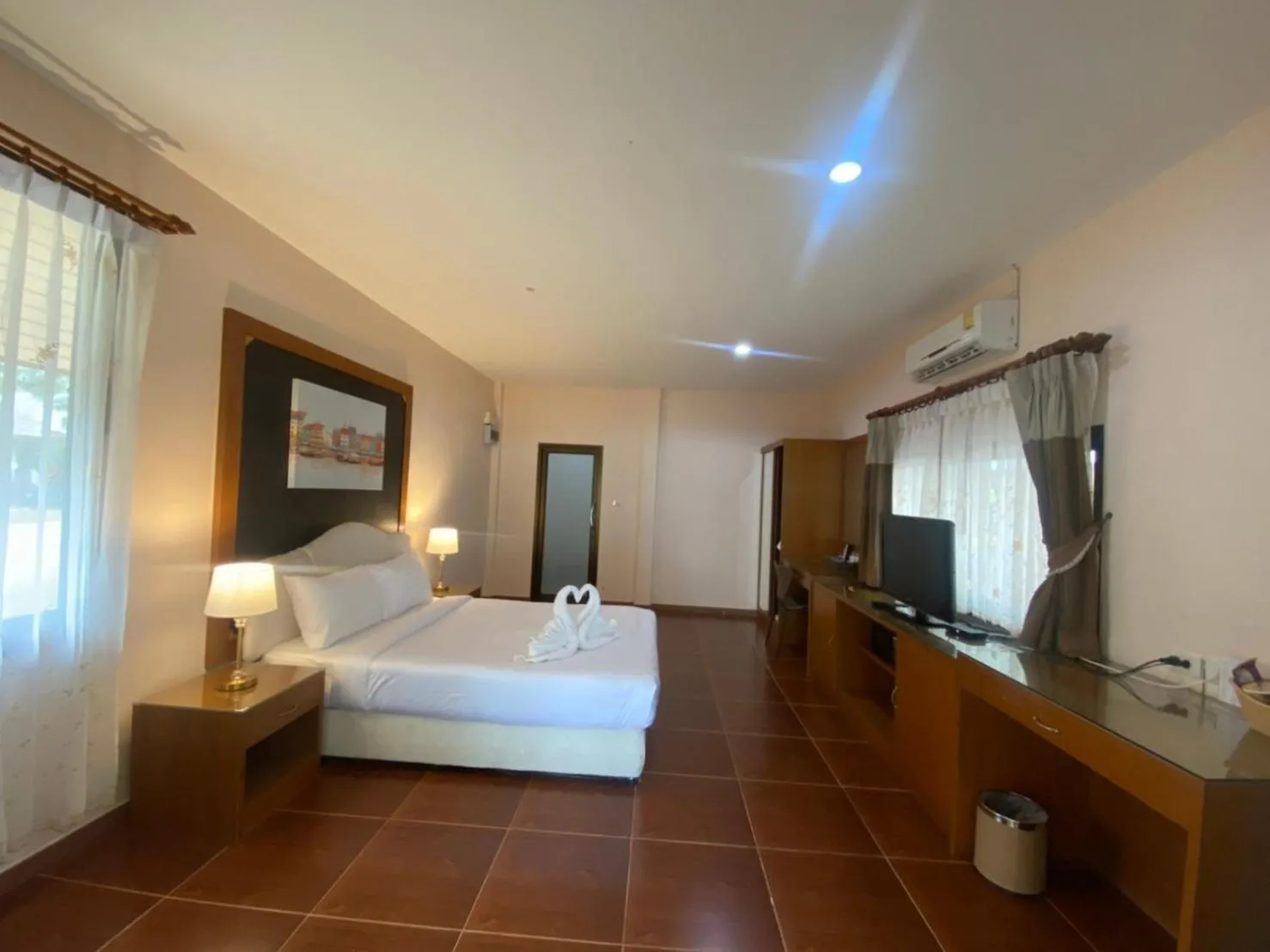 Bed in Chaithalay Khanom Resort