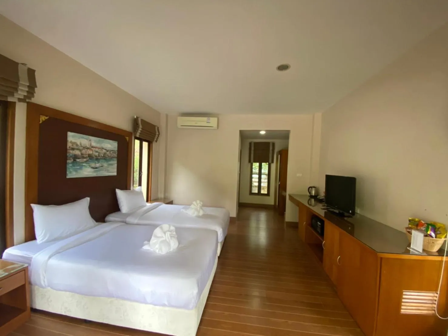 Bed in Chaithalay Khanom Resort