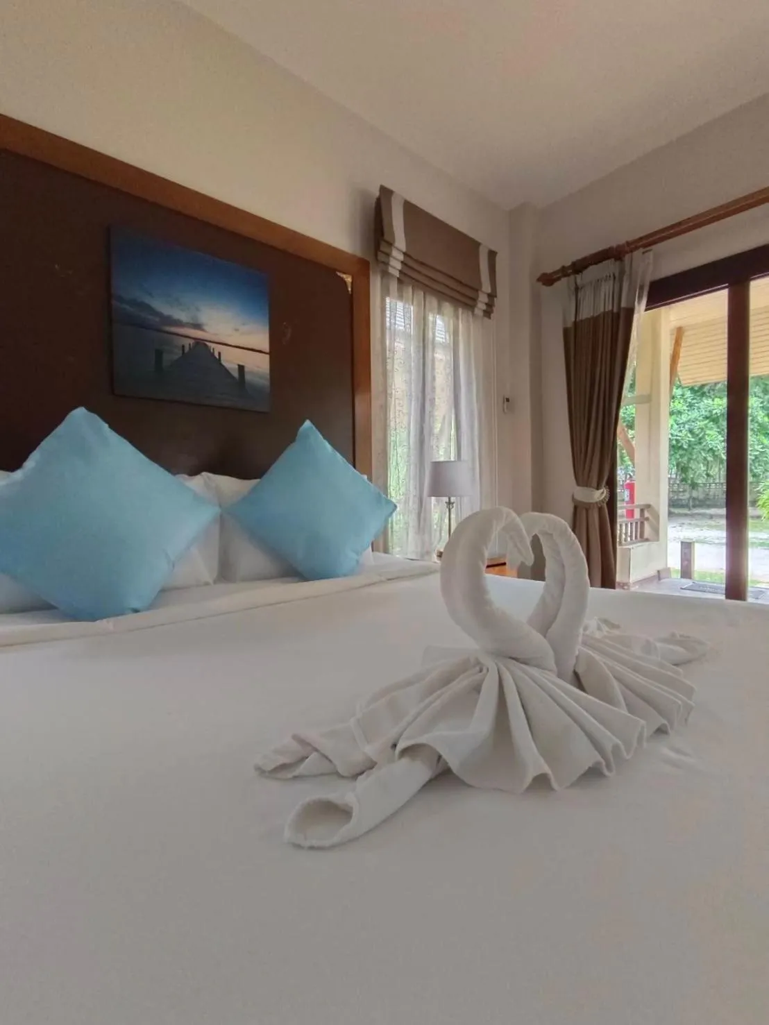 Bed in Chaithalay Khanom Resort