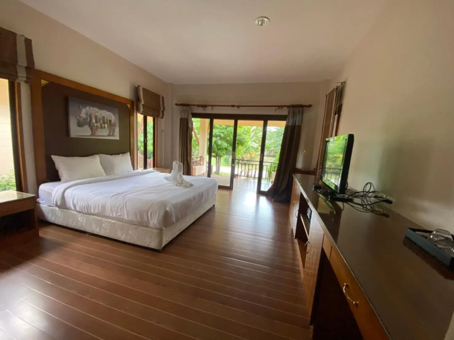 Bed in Chaithalay Khanom Resort