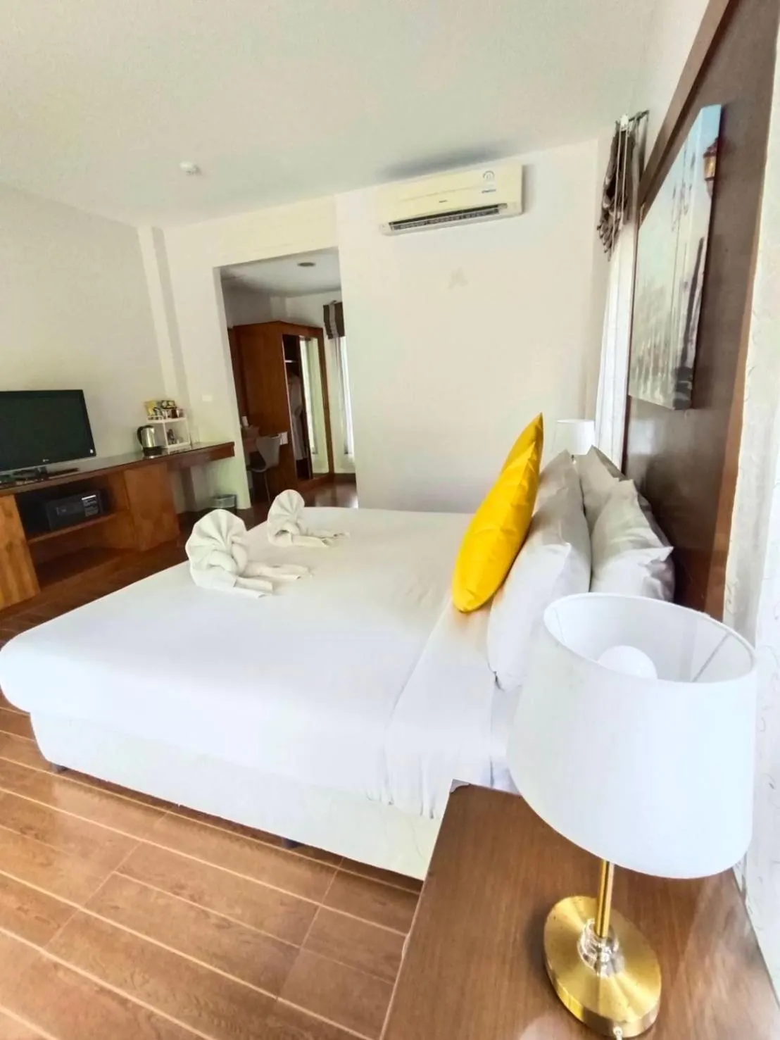 Bed in Chaithalay Khanom Resort