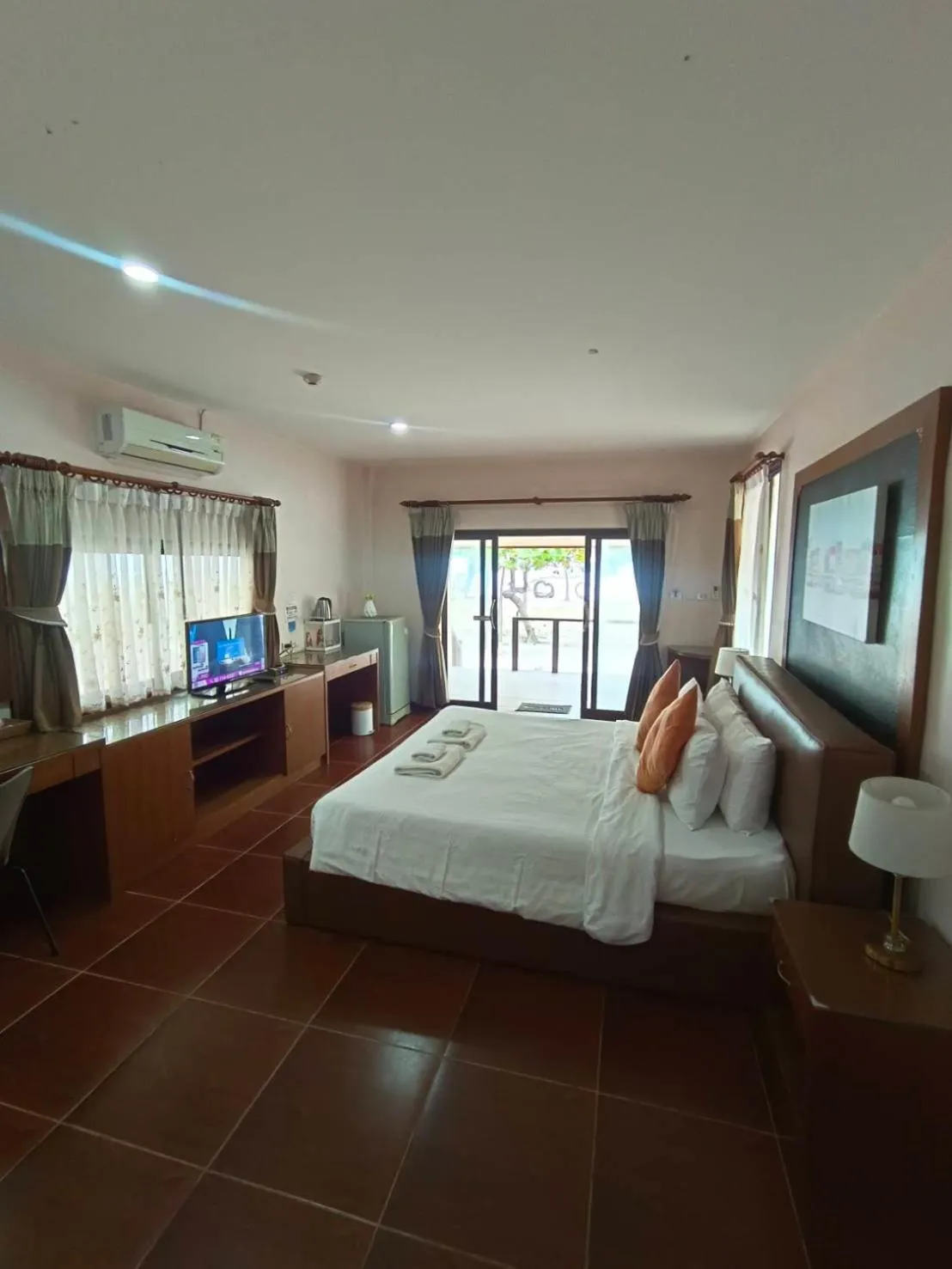 Bed in Chaithalay Khanom Resort