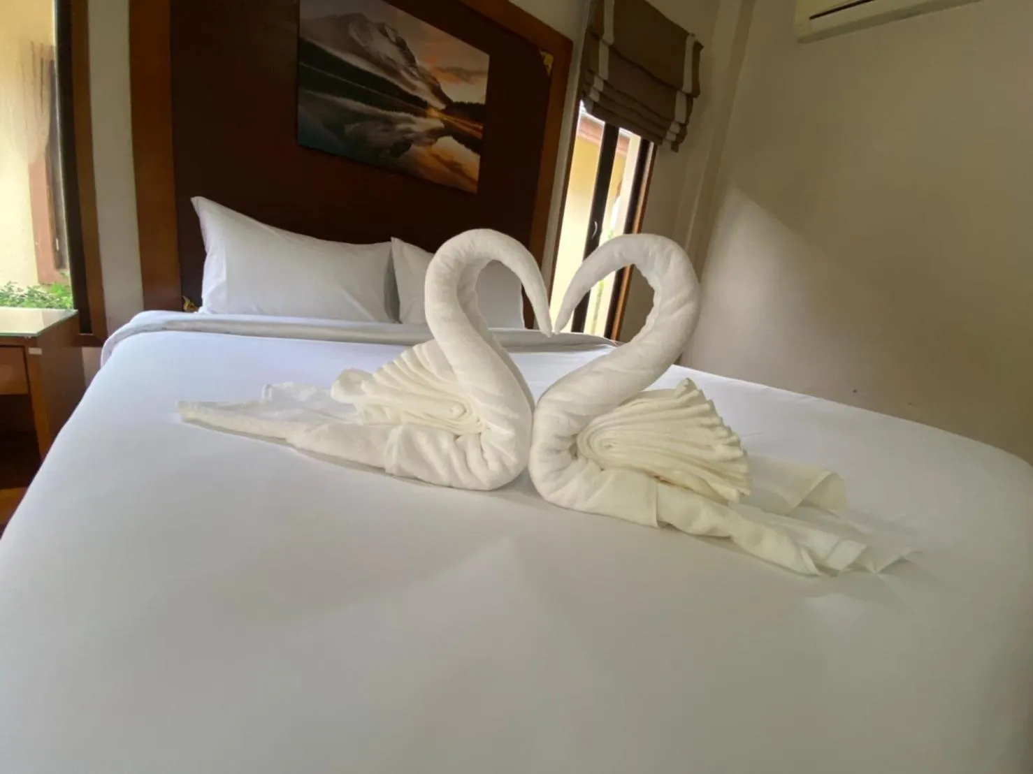 Bed in Chaithalay Khanom Resort