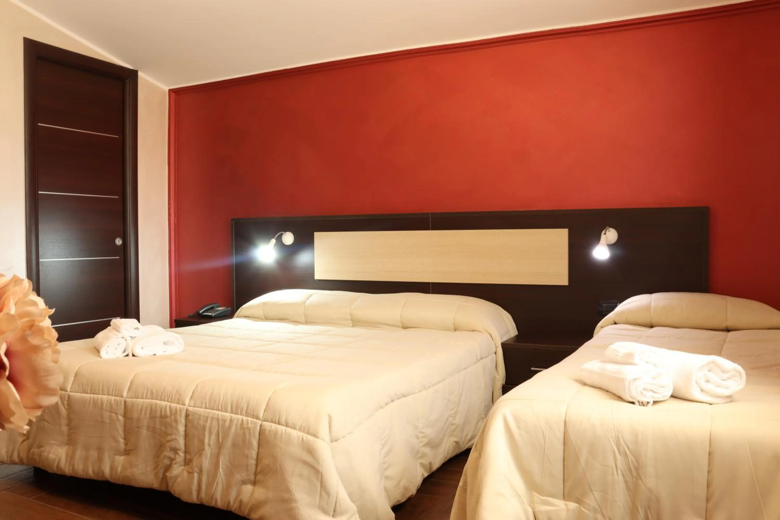 Bed in Hotel Paradiso