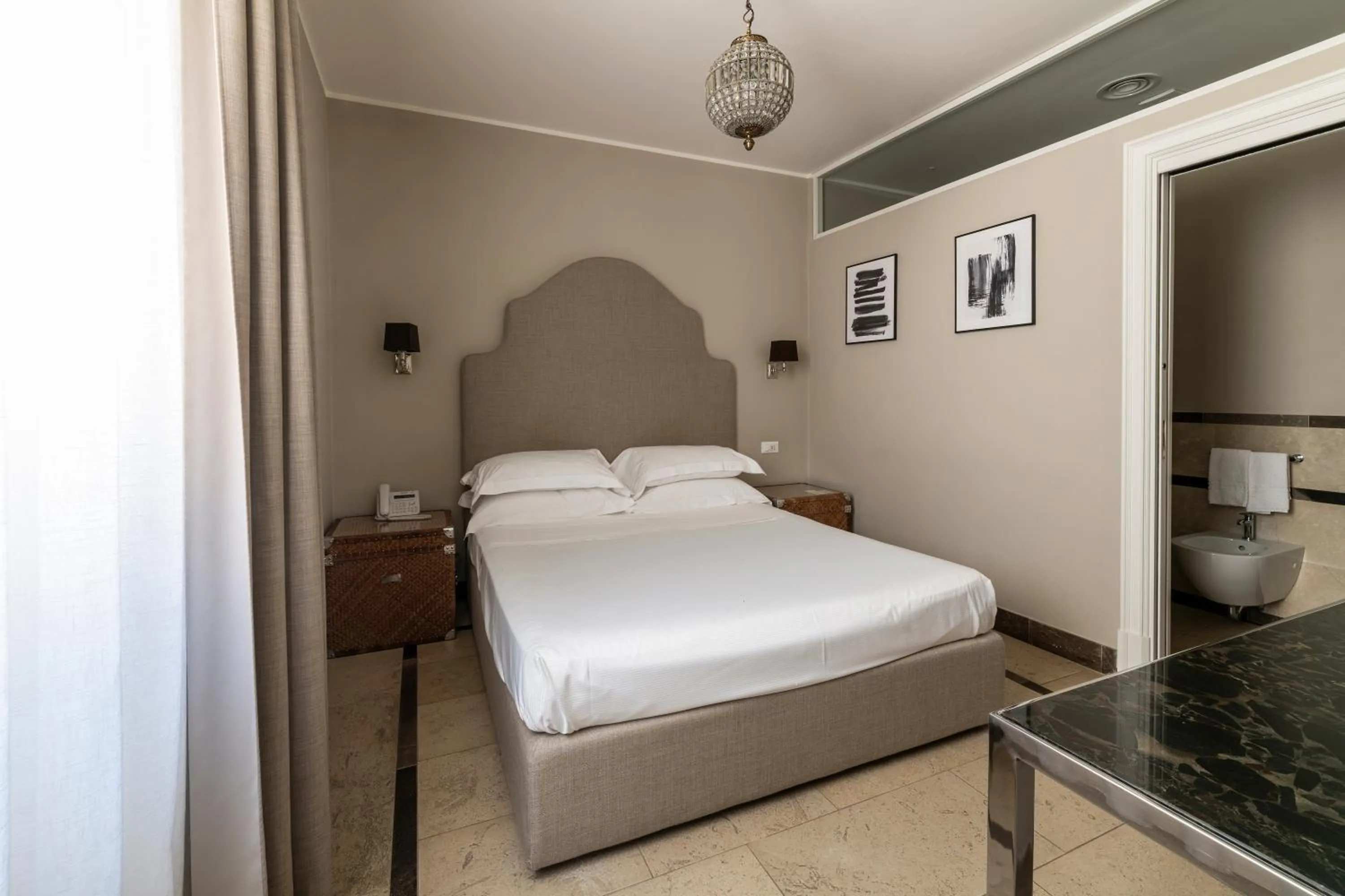 Bed in La Dépendance Hotel