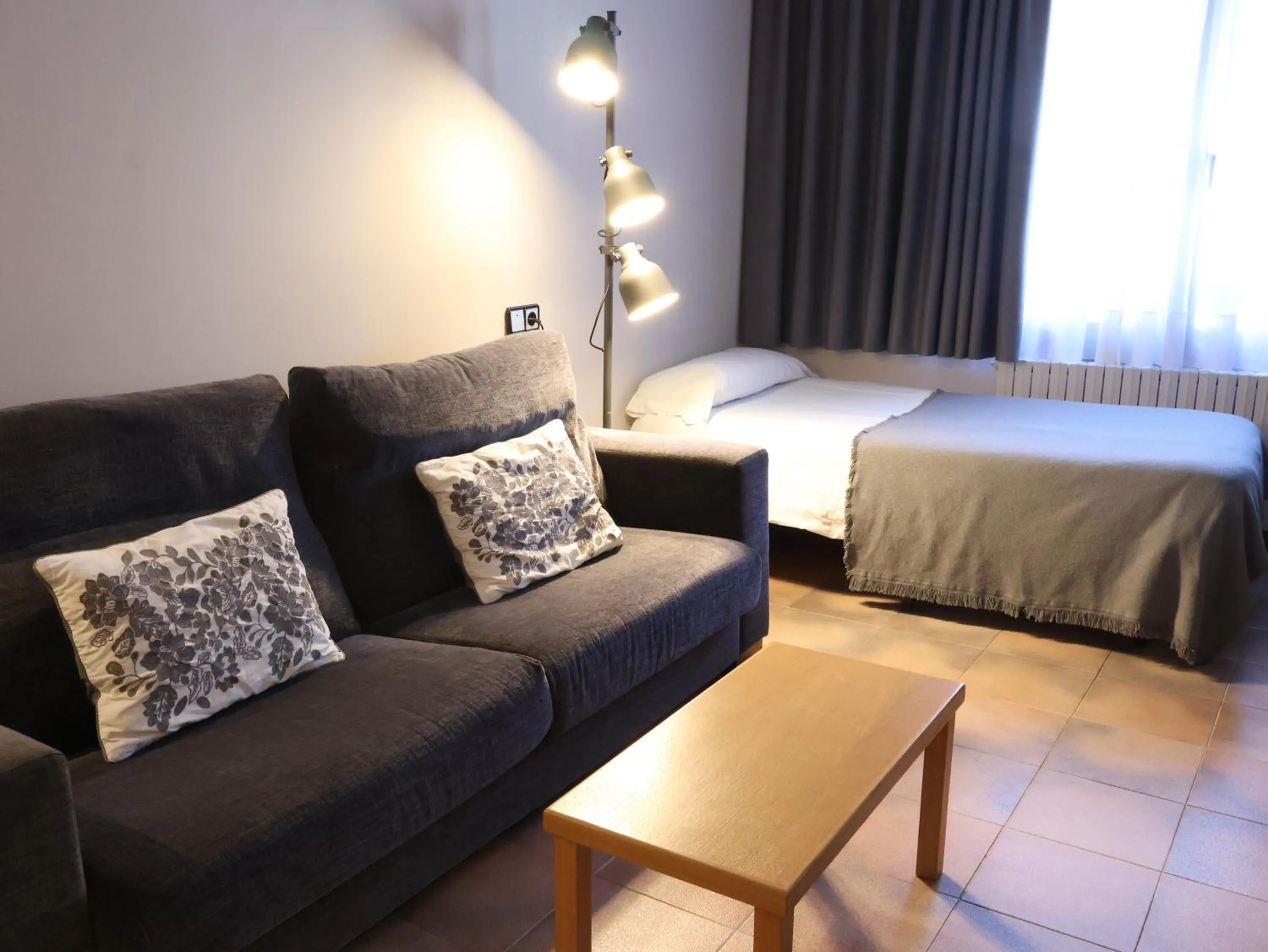 Bed in Aparthotel El Serch