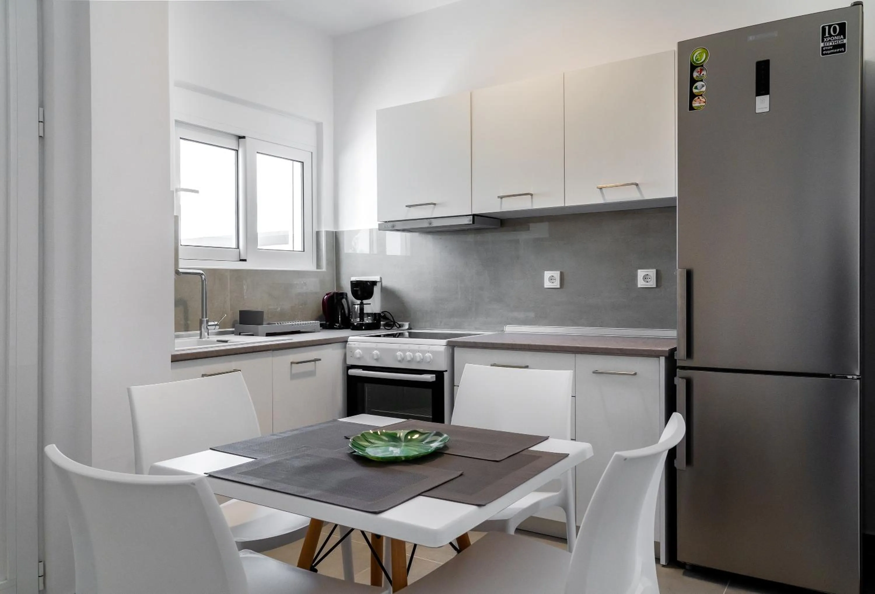 Kitchen or kitchenette in Aegean Horizon apartments