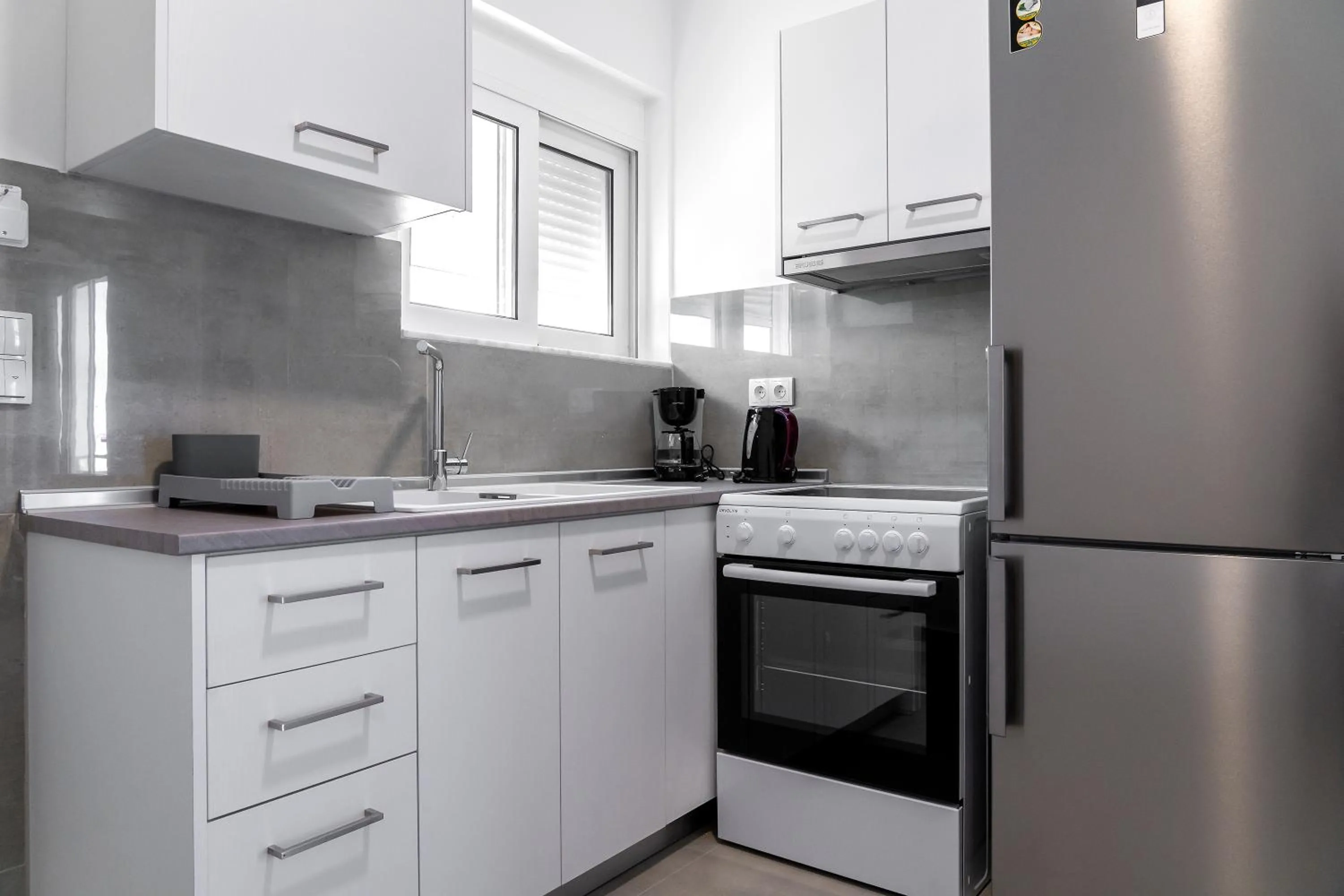 Kitchen or kitchenette in Aegean Horizon apartments