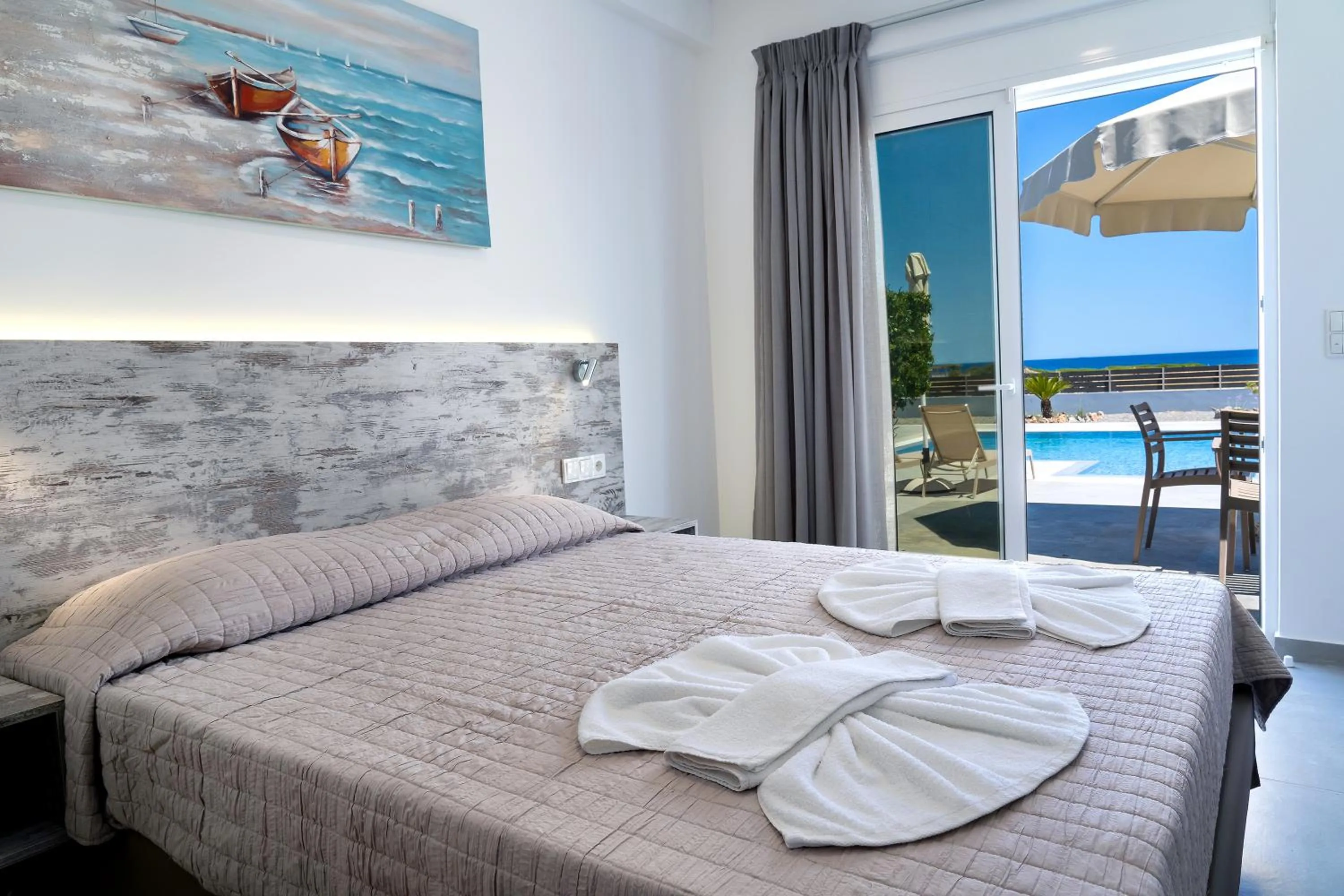 Bed in Aegean Horizon apartments