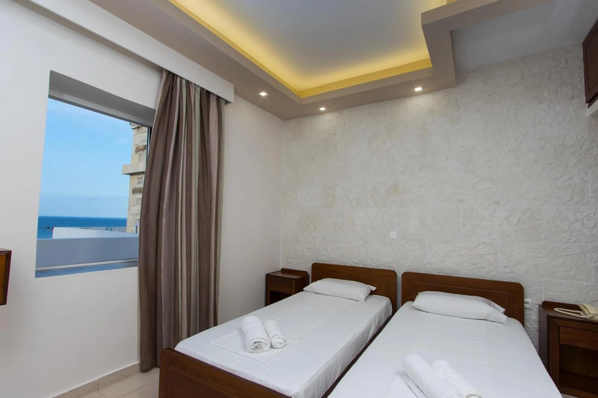 Bed in Abella Hotel
