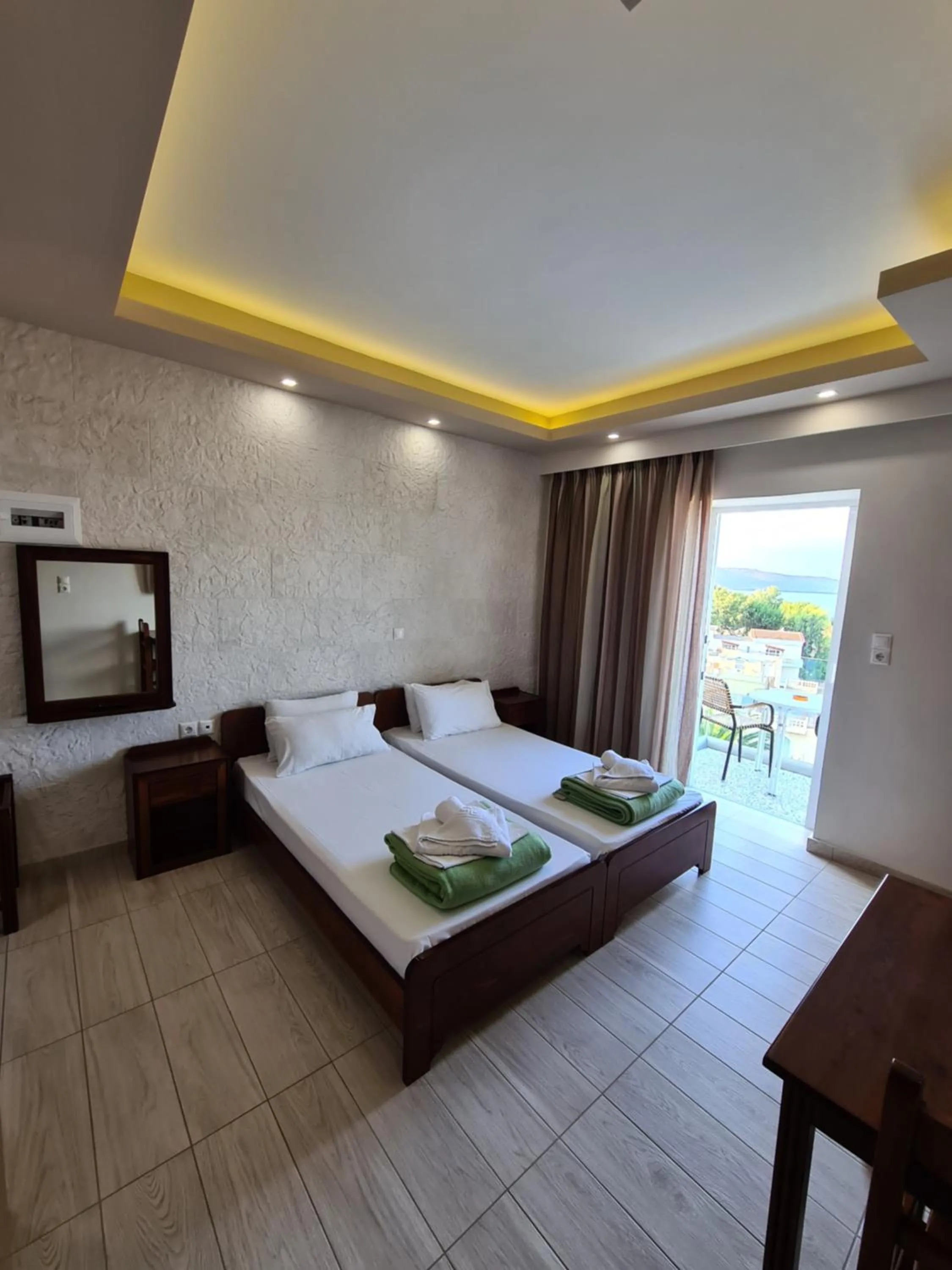 Bed in Abella Hotel