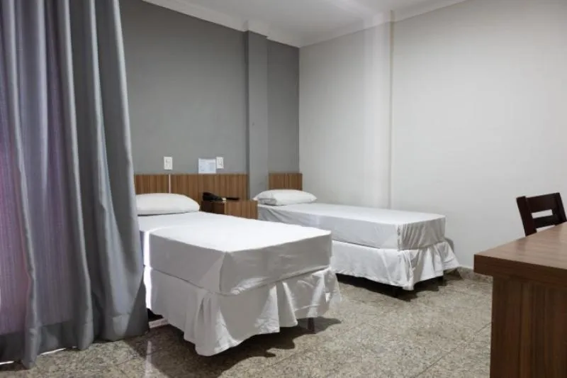 Bed in BOMBONATO PALACE HOTEL