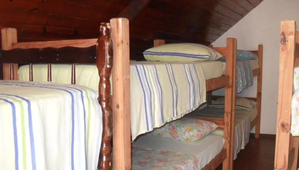 Bed in Ronaldo's Pousada